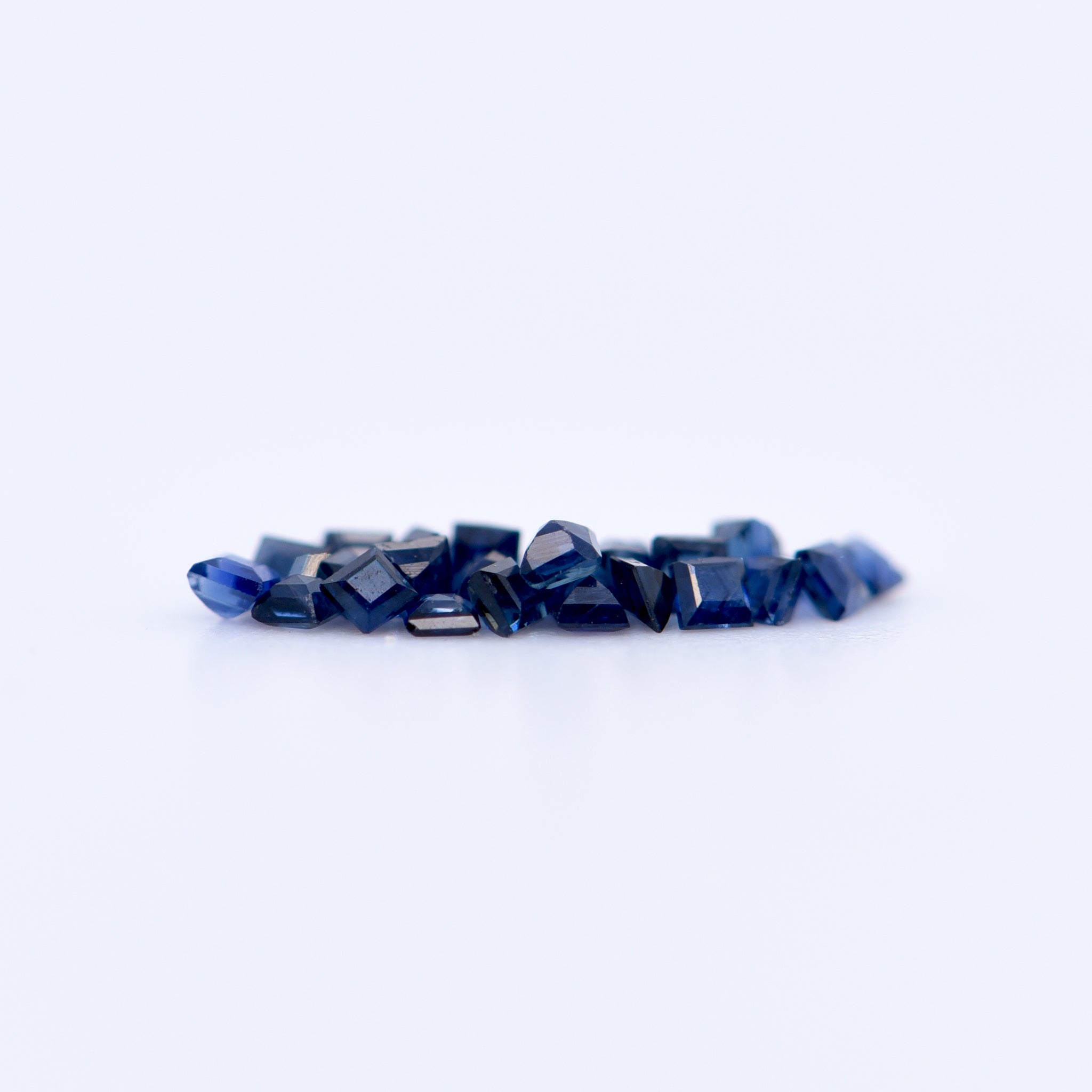 1.25x1.25 Square Step Cut Blue Sapphires