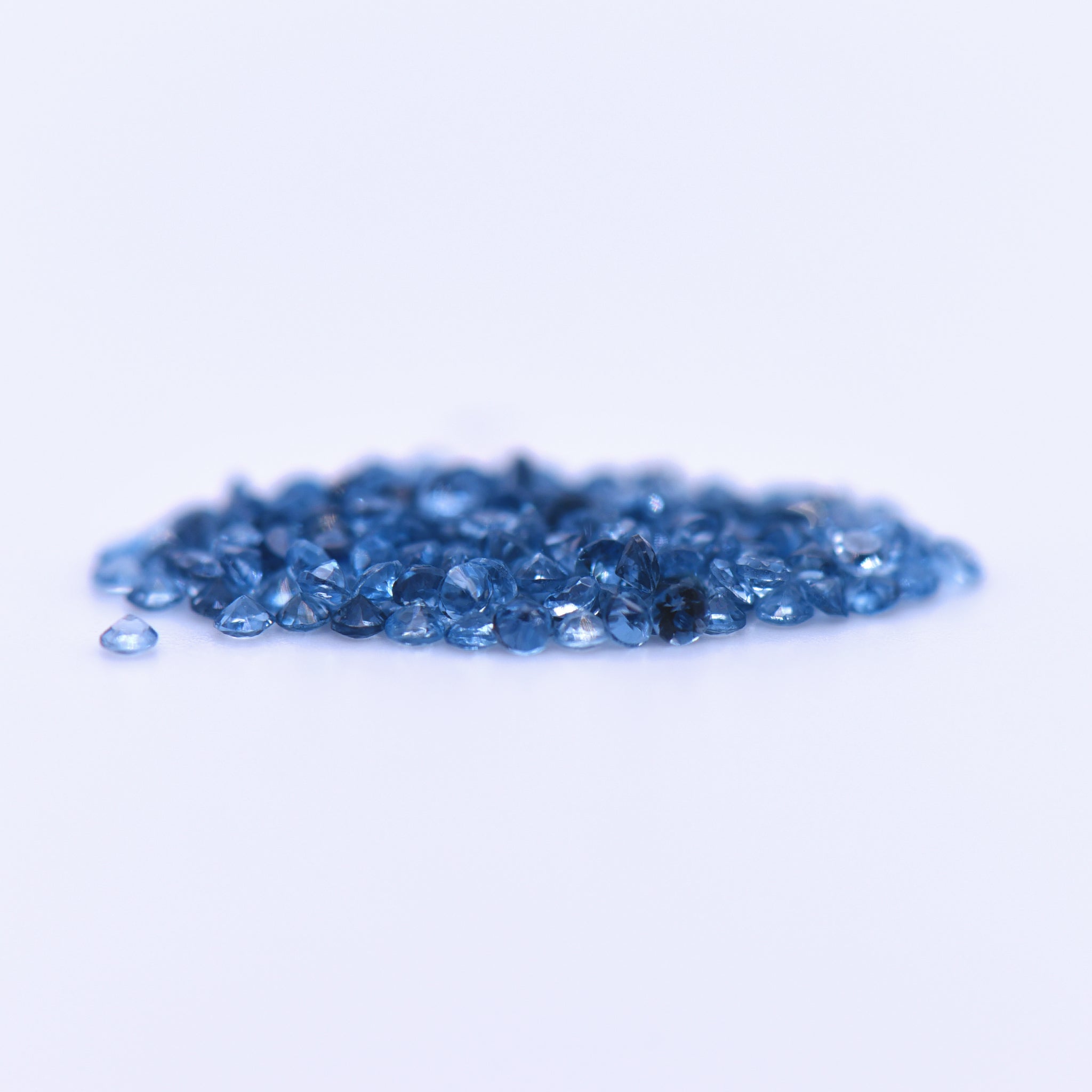 1.5mm Round Faceted London Blue Topaz