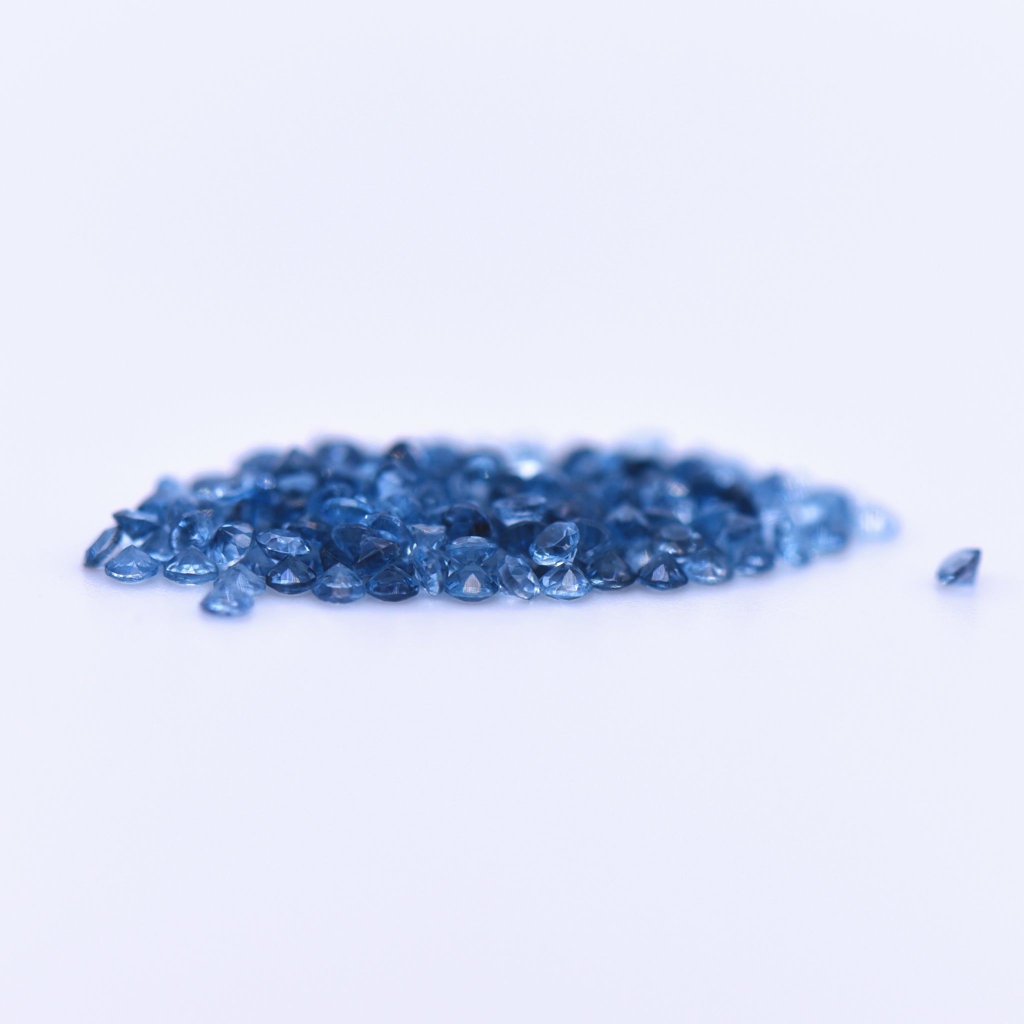 1.5mm Round Faceted London Blue Topaz