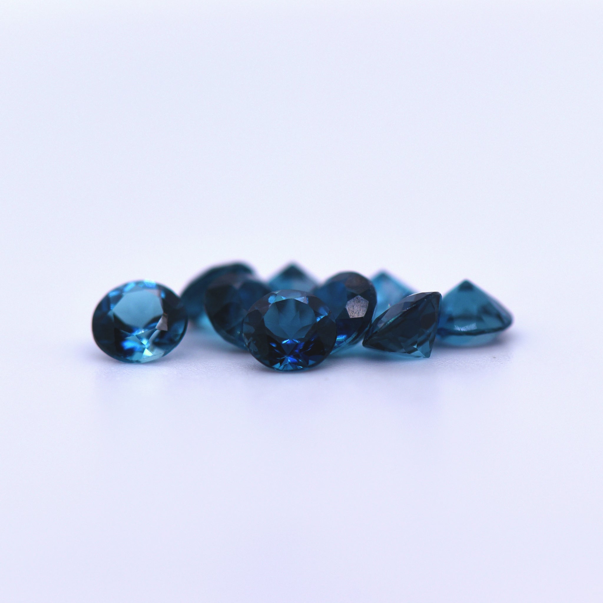 4.5mm Round Faceted London Blue Topaz