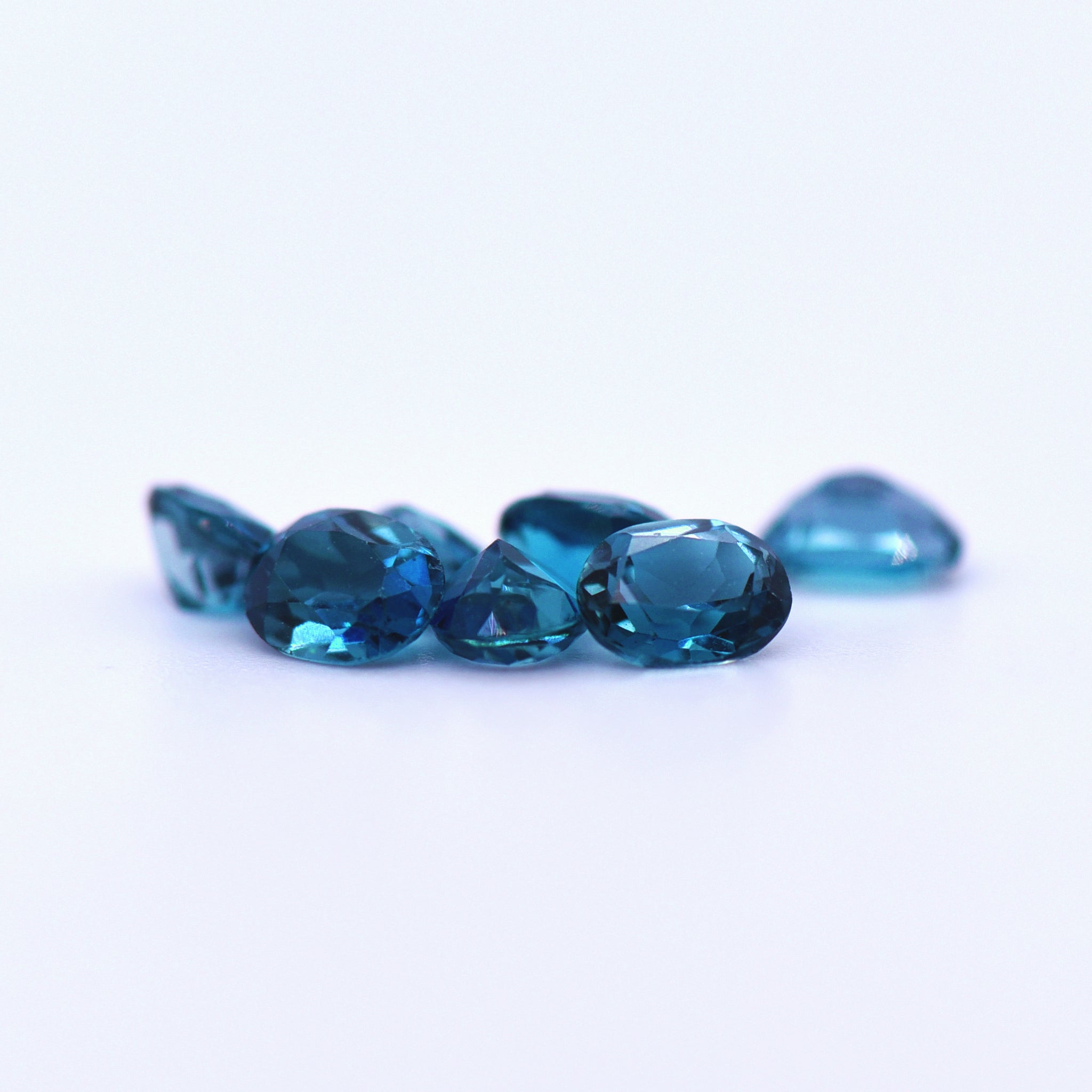 5x4 Oval Faceted London Blue Topaz