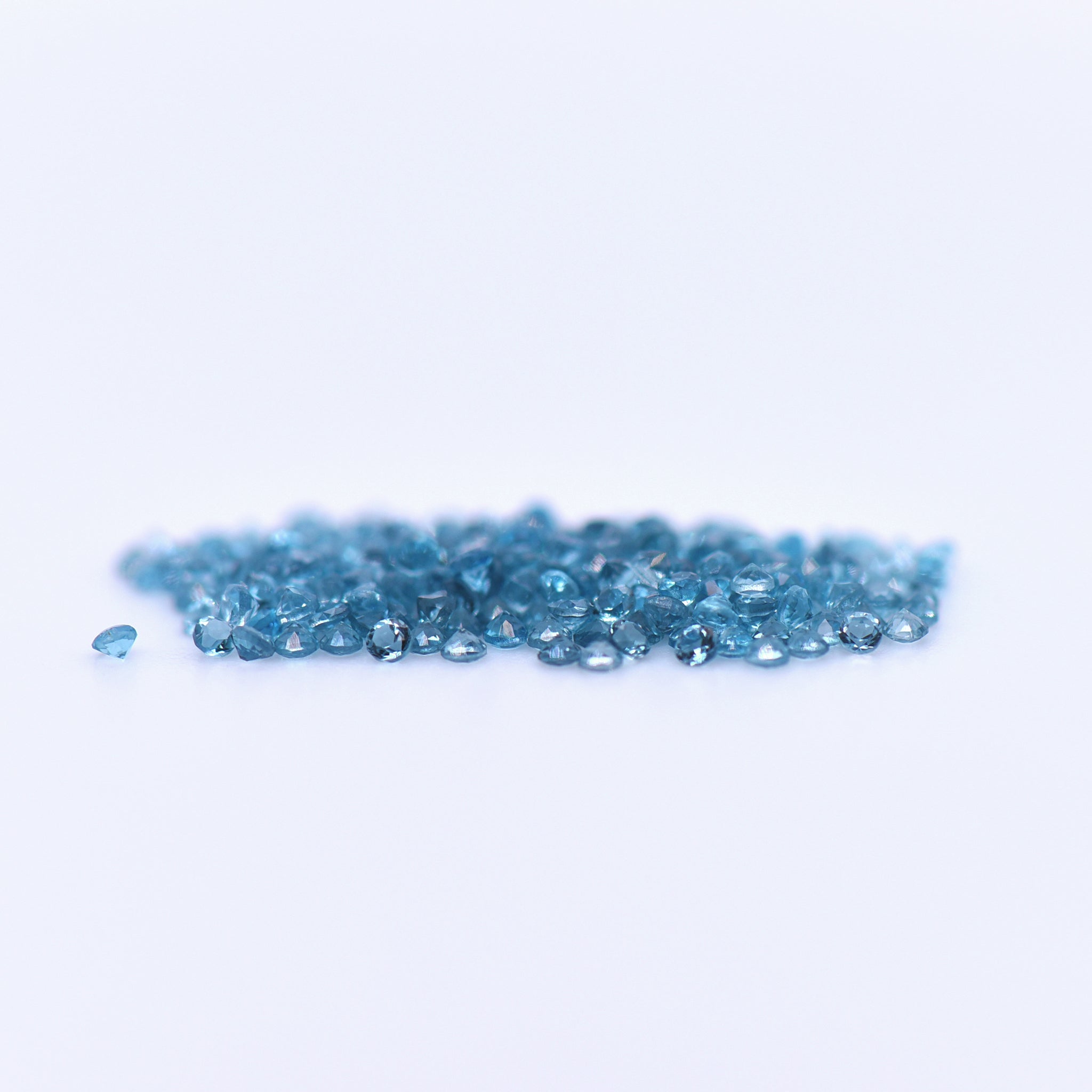 1.25mm Round Faceted London Blue Topaz