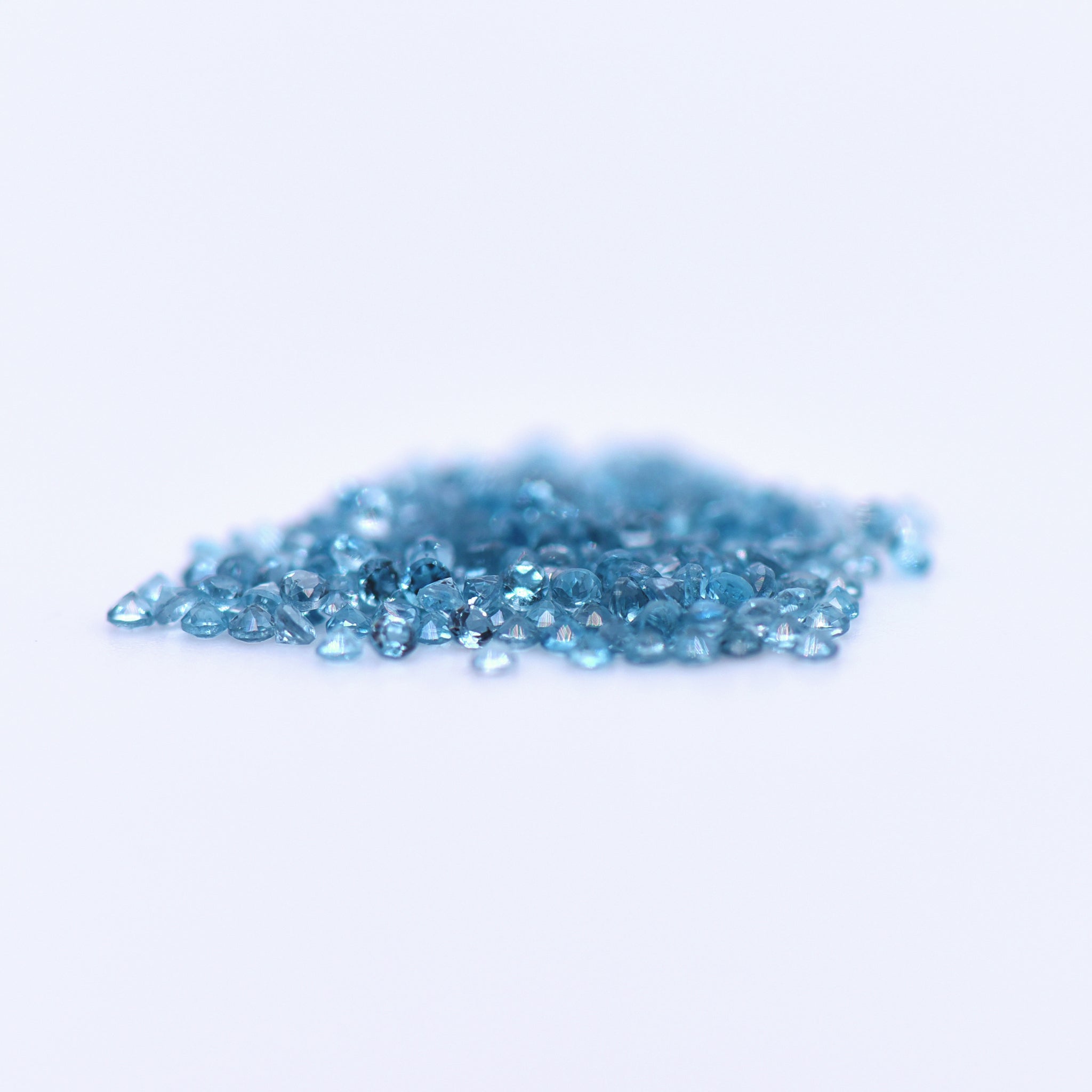 1.25mm Round Faceted London Blue Topaz