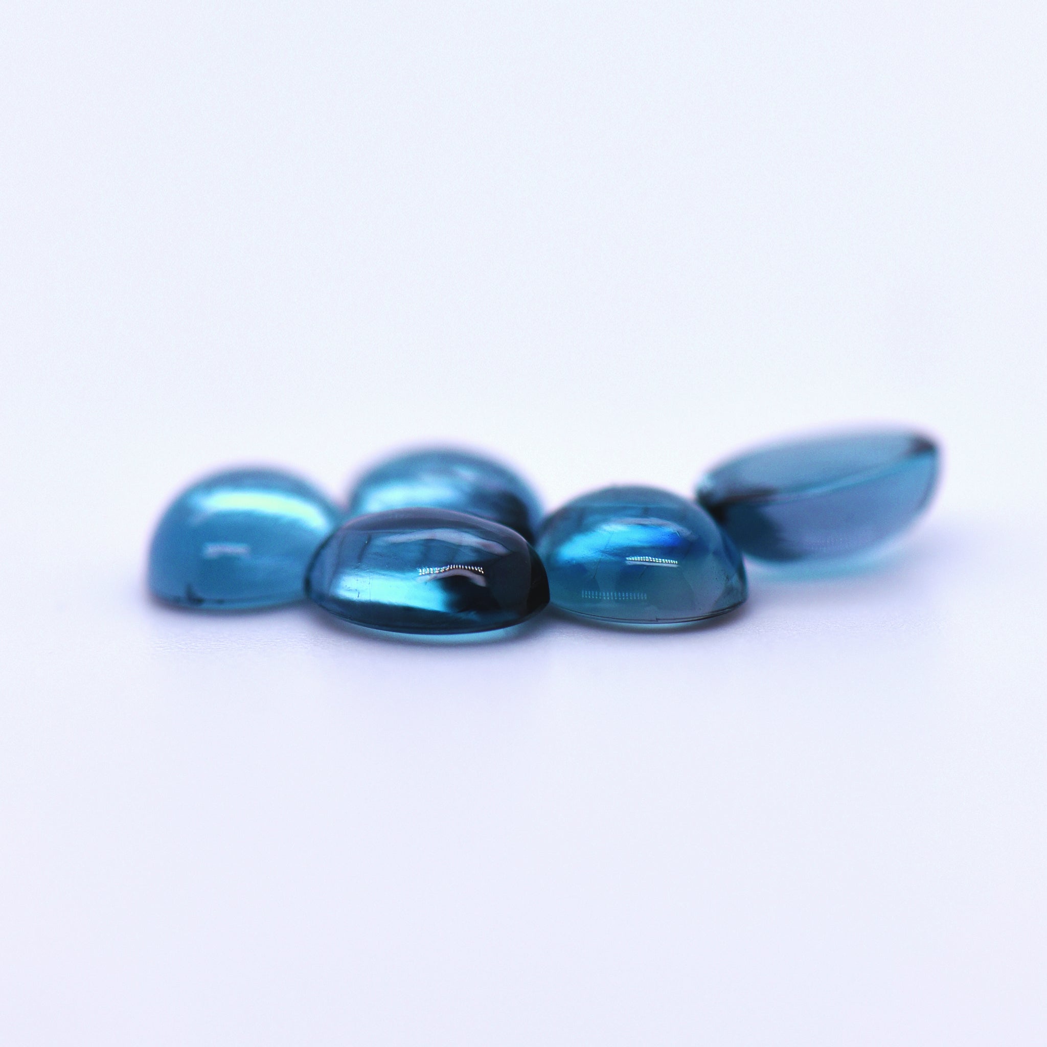 7x5 Oval Cabochon London Blue Topaz