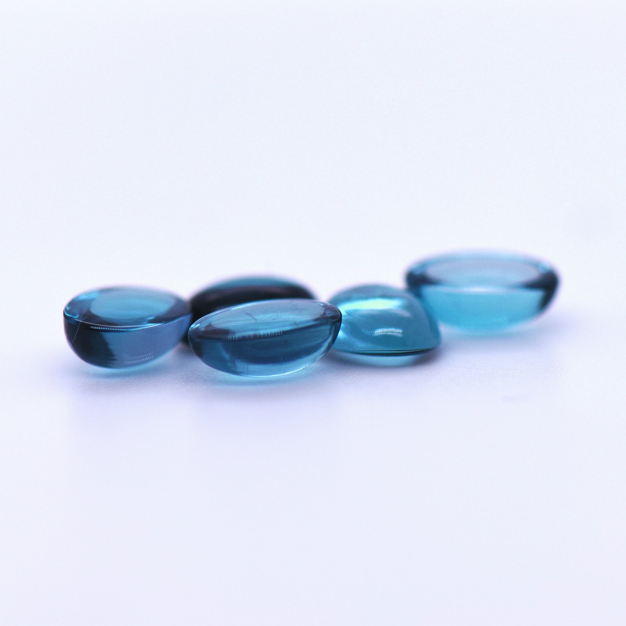 7x5 Oval Cabochon London Blue Topaz