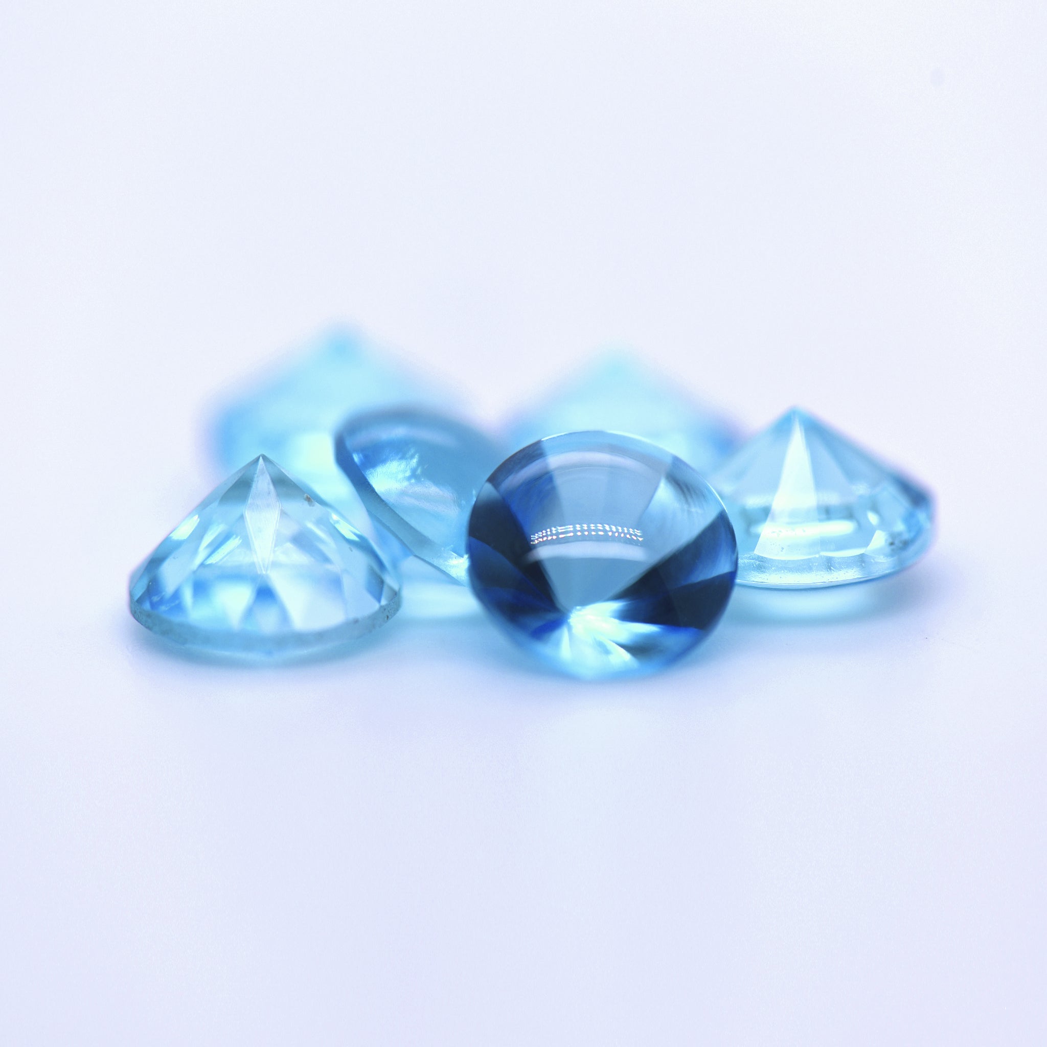 8mm Round Faceted Buff Top Swiss Blue Topaz