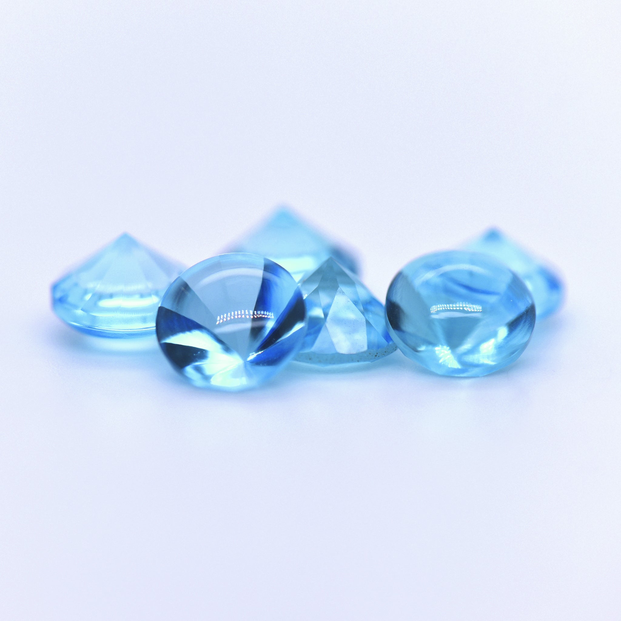 8mm Round Faceted Buff Top Swiss Blue Topaz