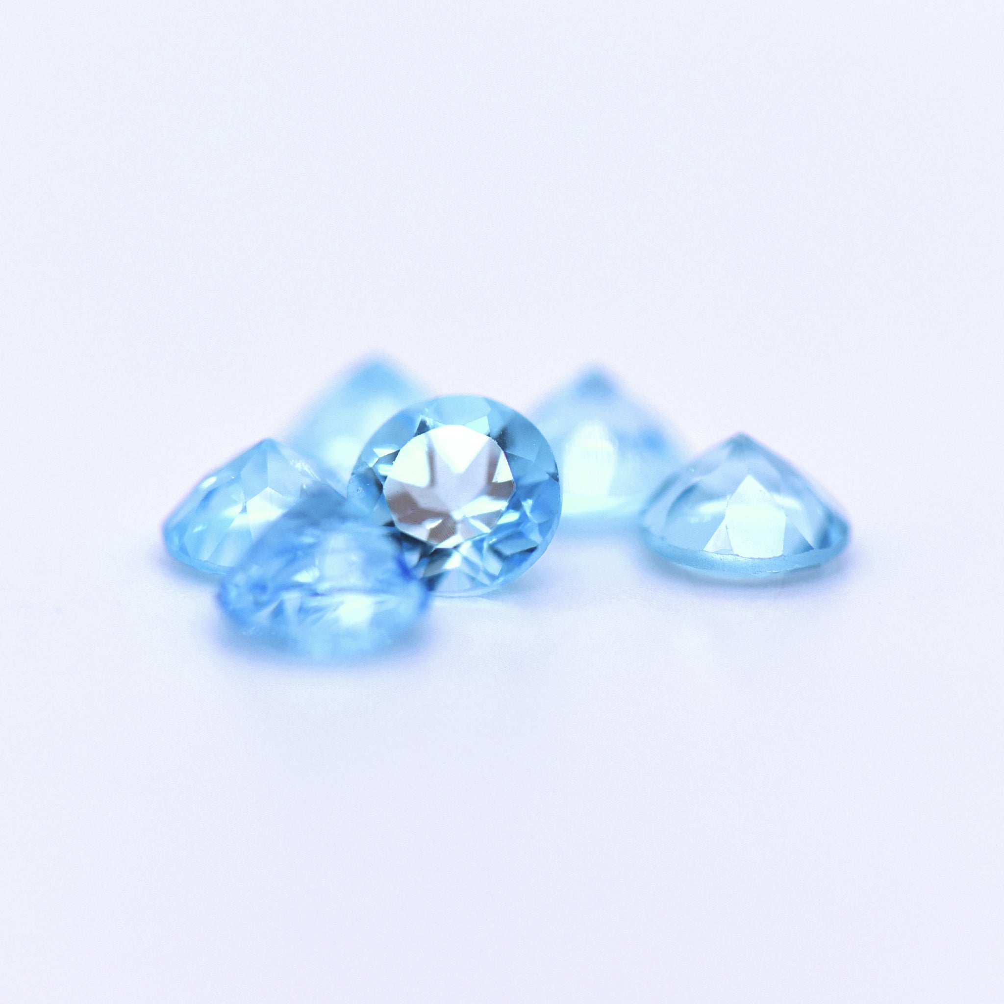5.5mm Round Faceted Swiss Blue Topaz