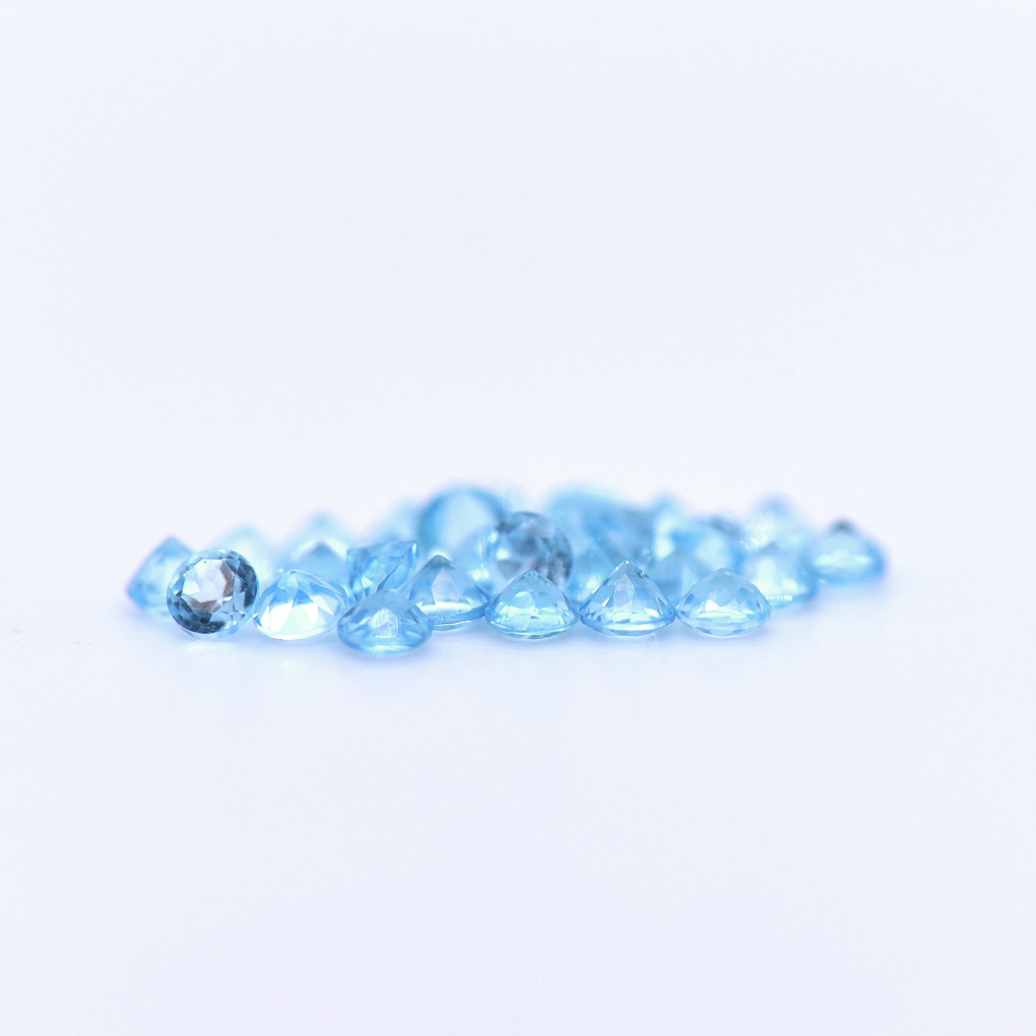 2.5mm Round Faceted Swiss Blue Topaz