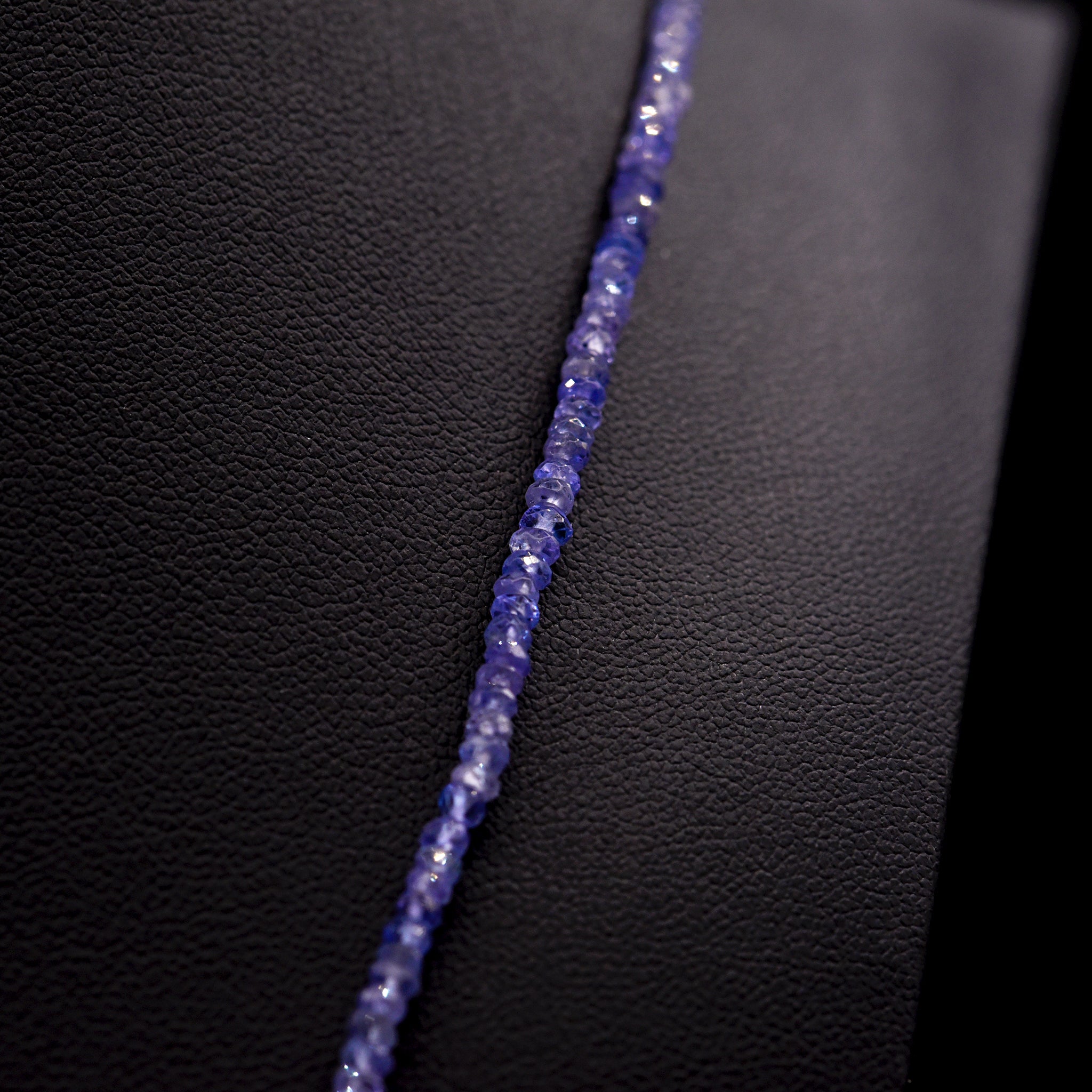 2.5mm Faceted Button Purple Tanzanite Bead Strings