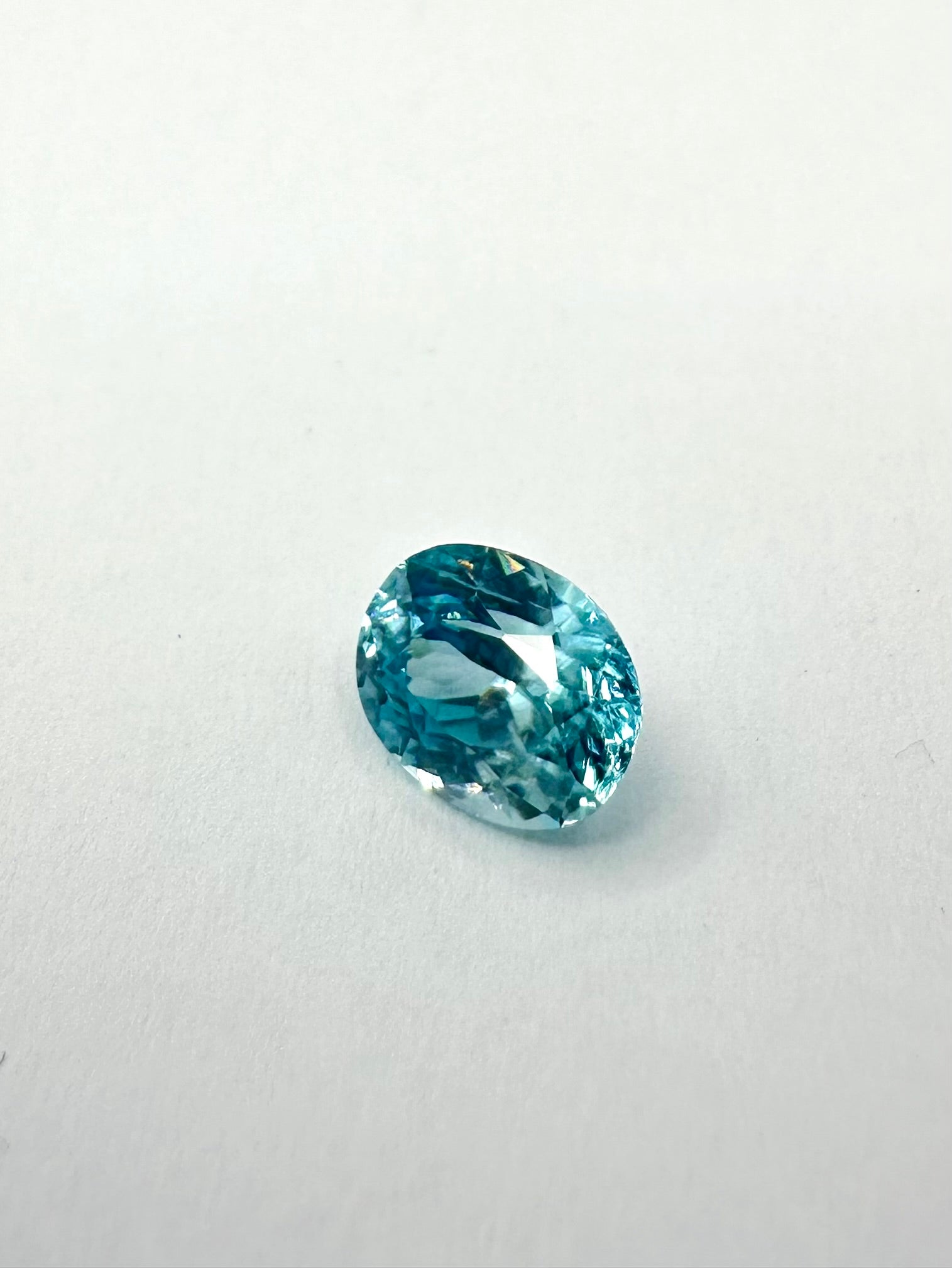 1.97cts 7.71x6.14mm Round Teal Blue Zircon