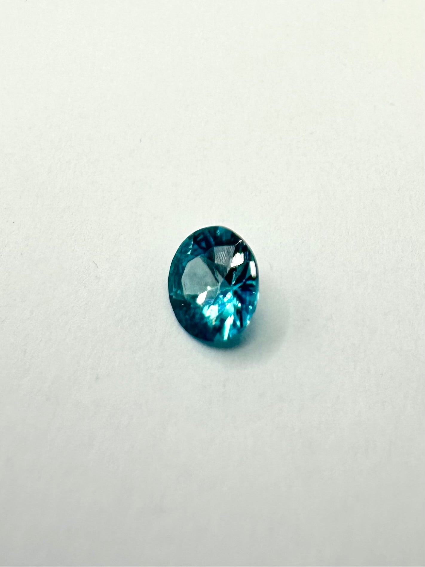 0.97cts 5.52x3.40 Round Teal Blue Zircon