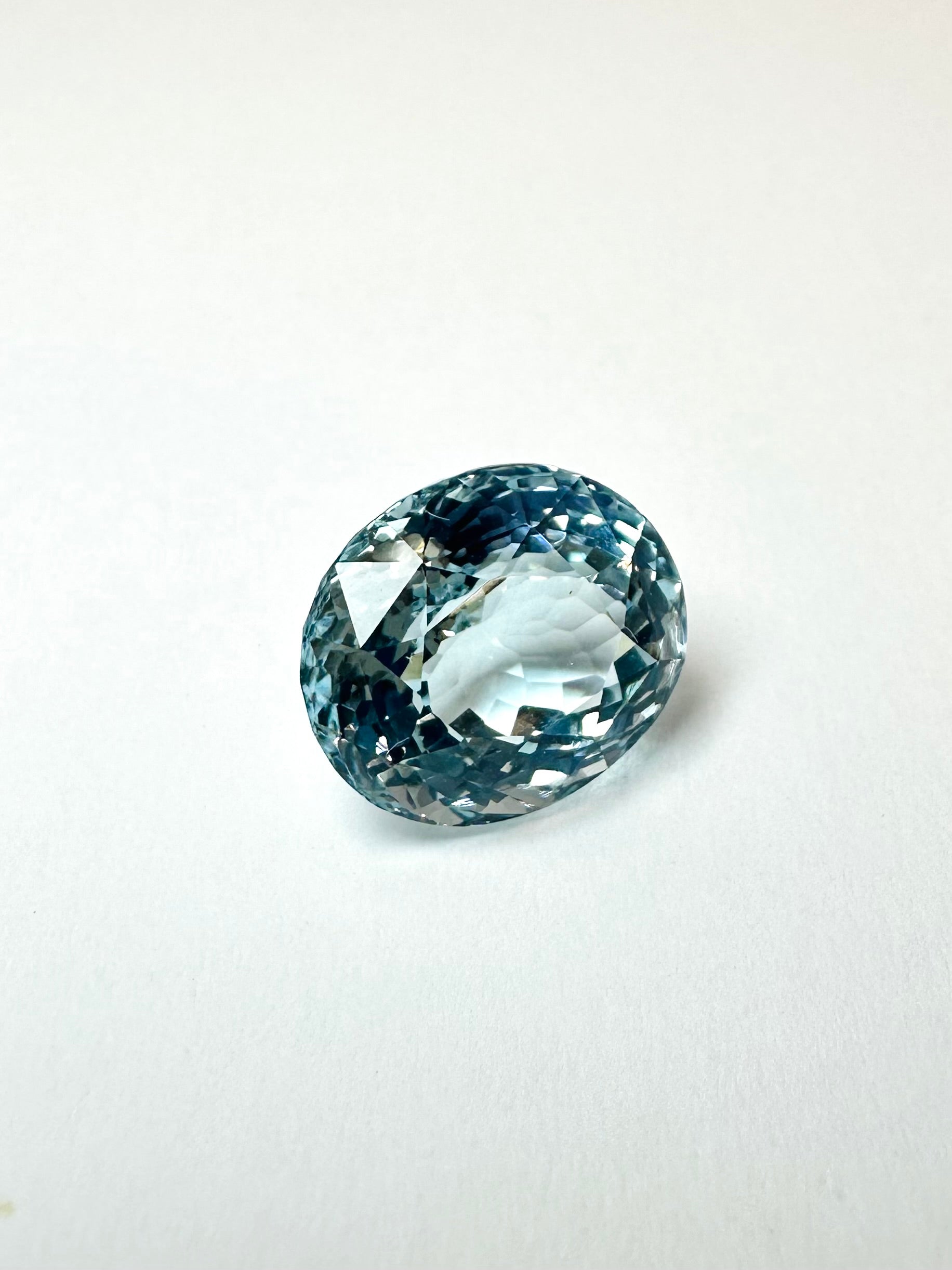 12.40cts 14.10x12.25mm Oval Faceted Blue Topaz
