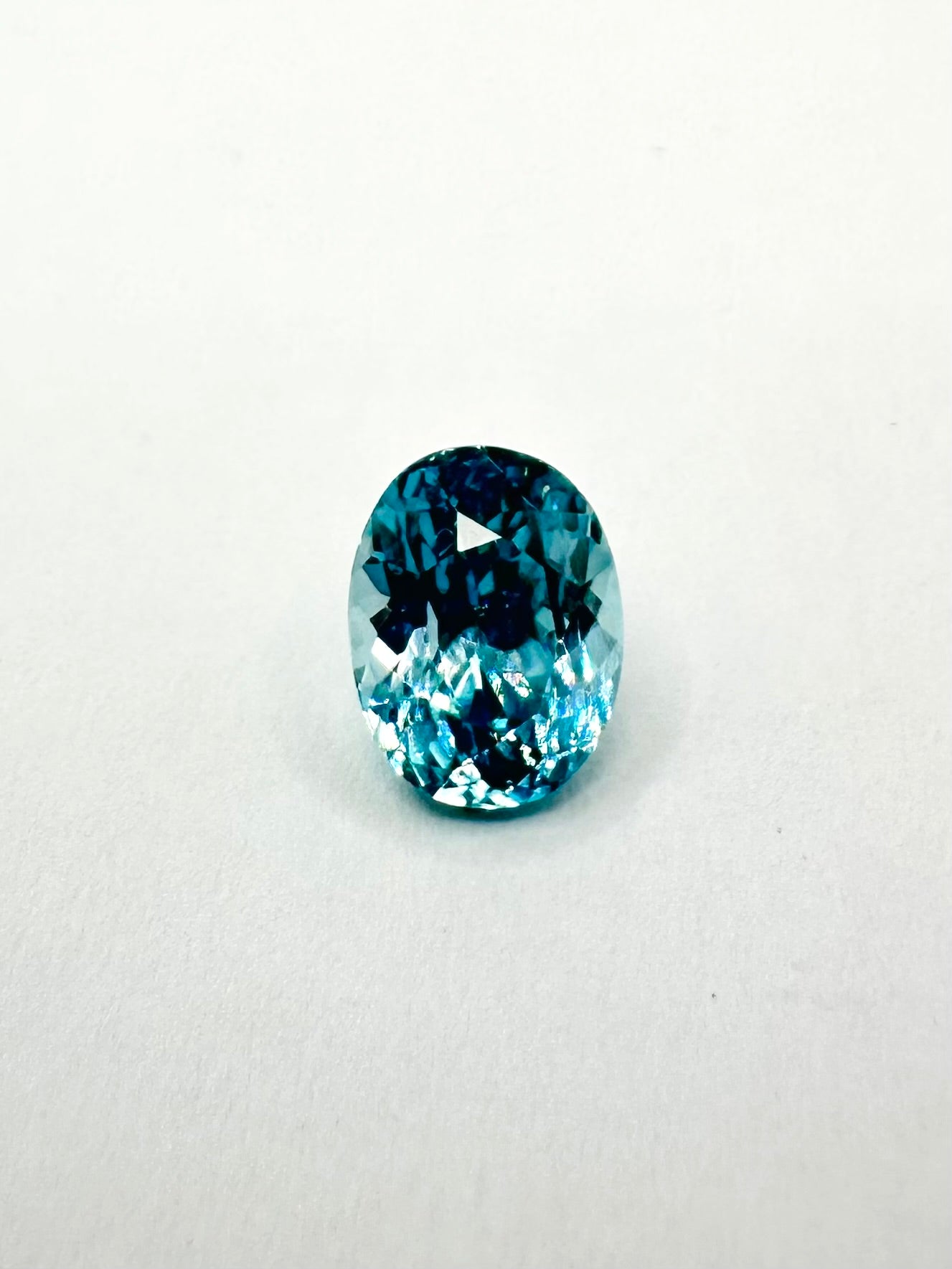 1.97cts 7.71x6.14mm Round Teal Blue Zircon