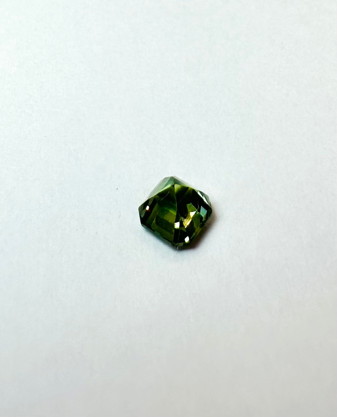 0.65cts 4.74x4.66 Octagon faceted Green Sapphire