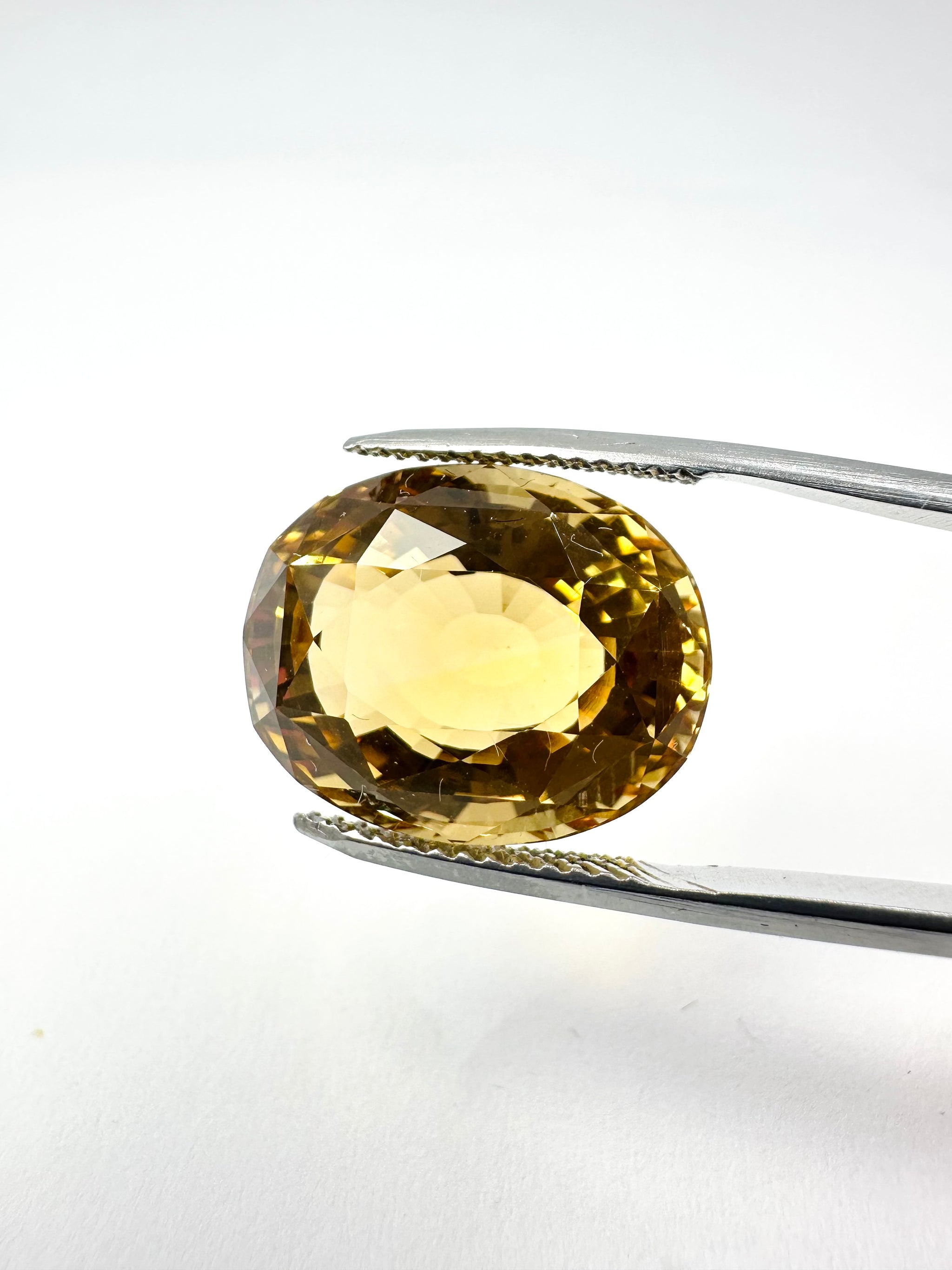 14.56cts 16.72x13.42mm Oval Faceted Citrine