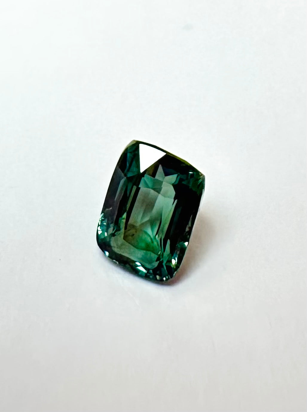 1.57cts 7.13x5.33mm Cushion Faceted Teal Sapphire
