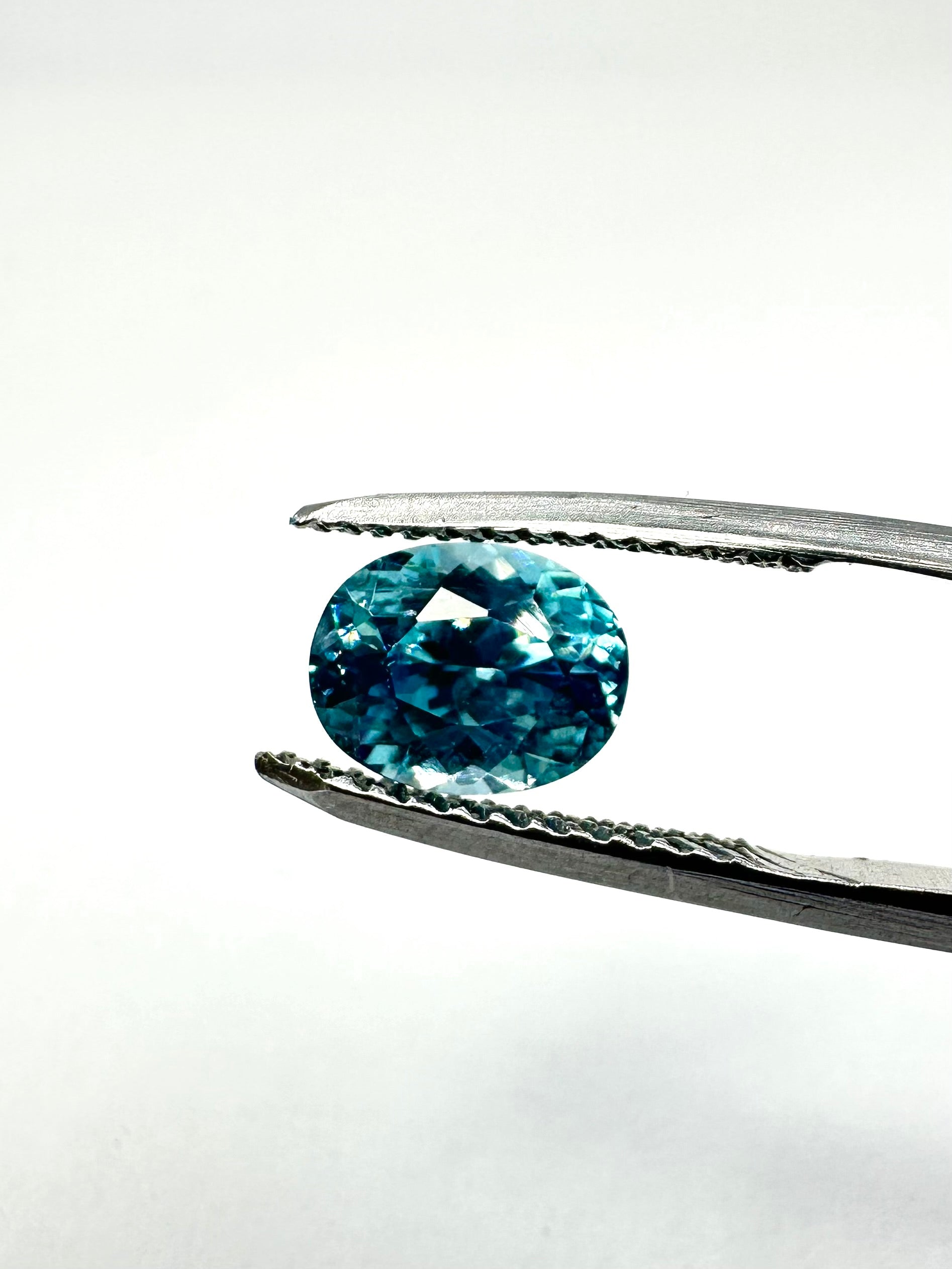 1.97cts 7.71x6.14mm Round Teal Blue Zircon