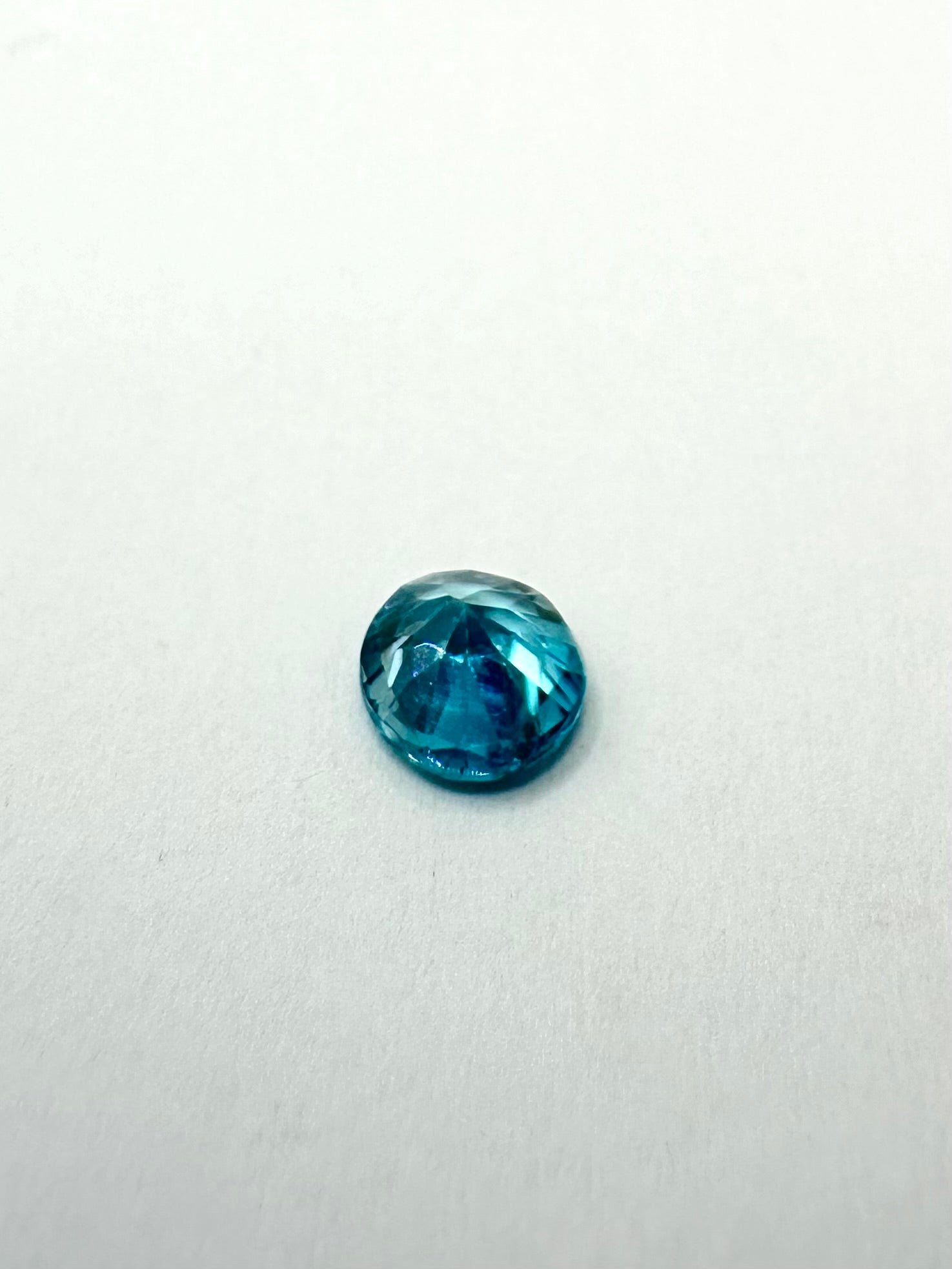 0.97cts 5.52x3.40 Round Teal Blue Zircon