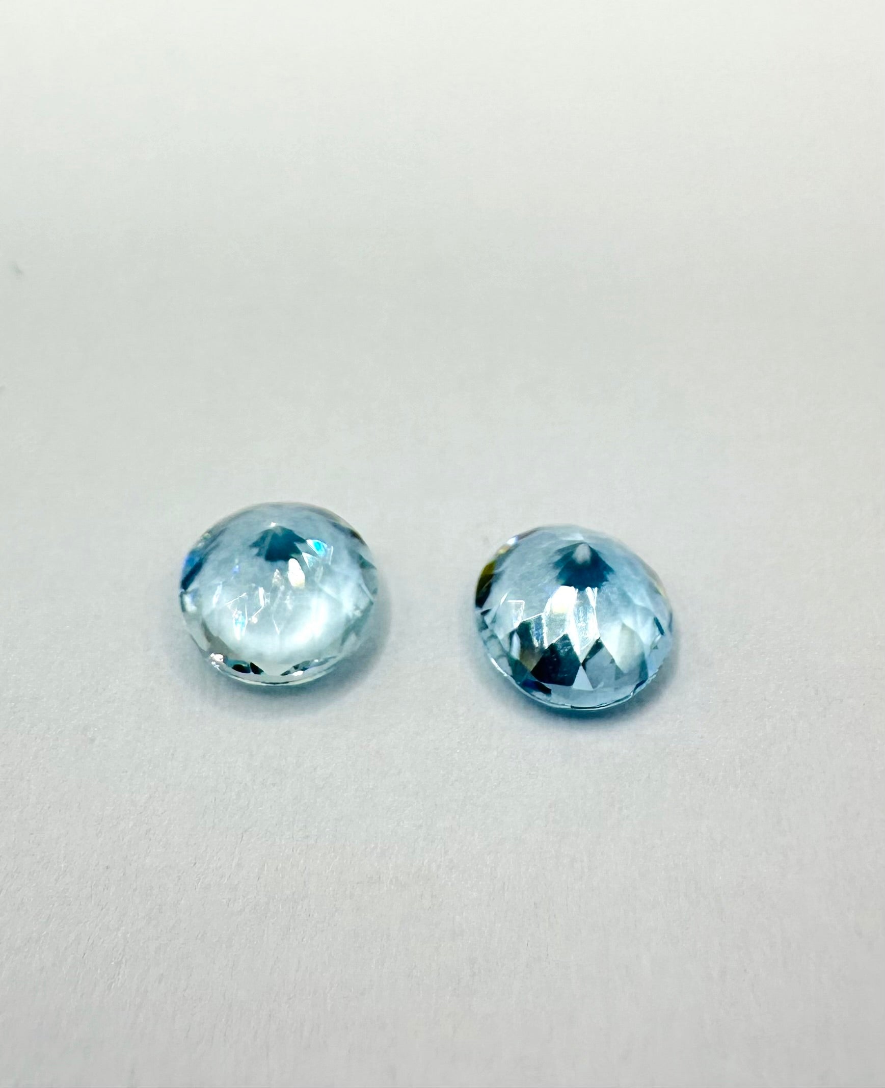 1.54cts 6mm Round faceted Aquamarine Pair