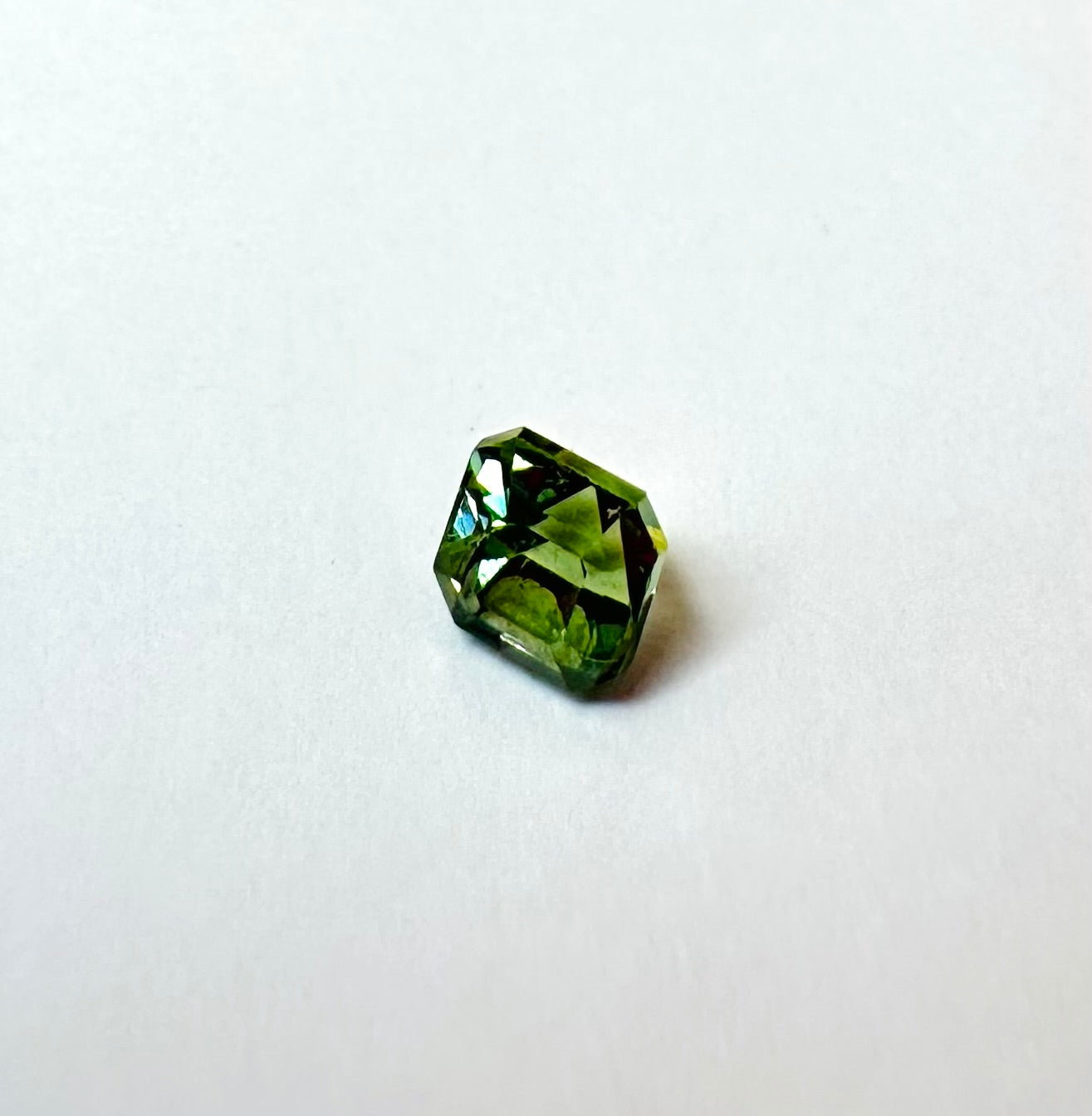 0.65cts 4.74x4.66 Octagon faceted Green Sapphire