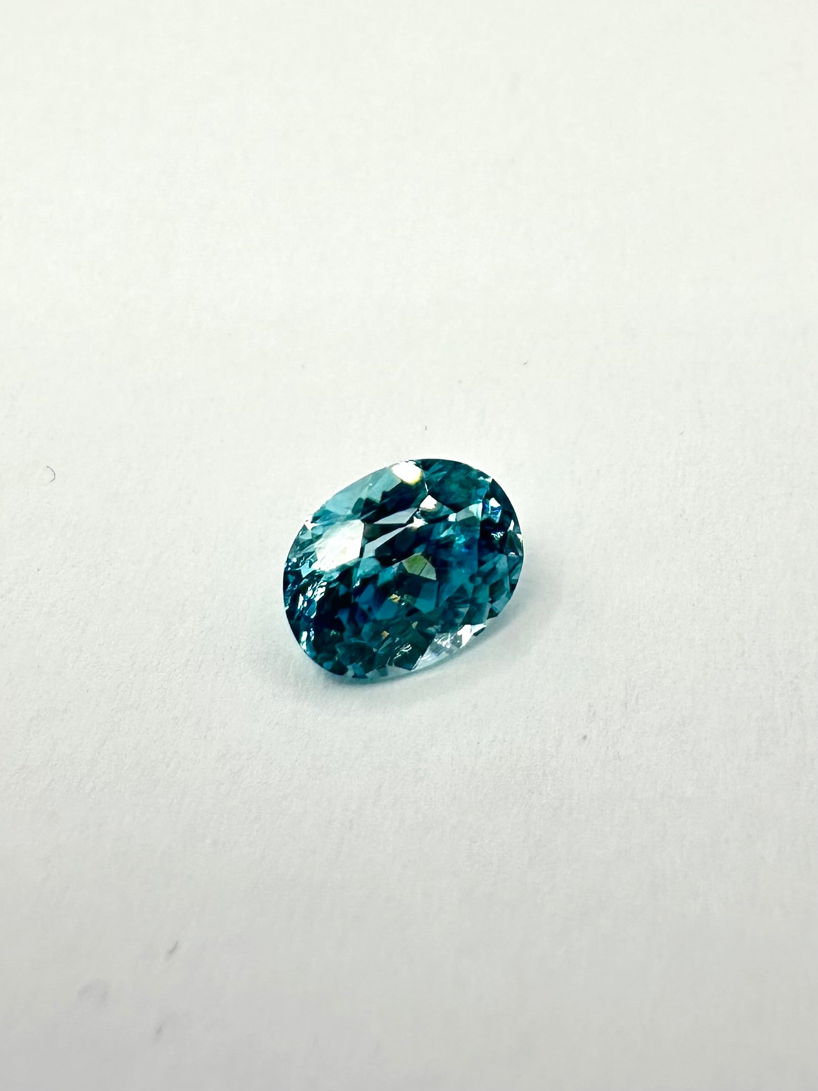 1.97cts 7.71x6.14mm Round Teal Blue Zircon