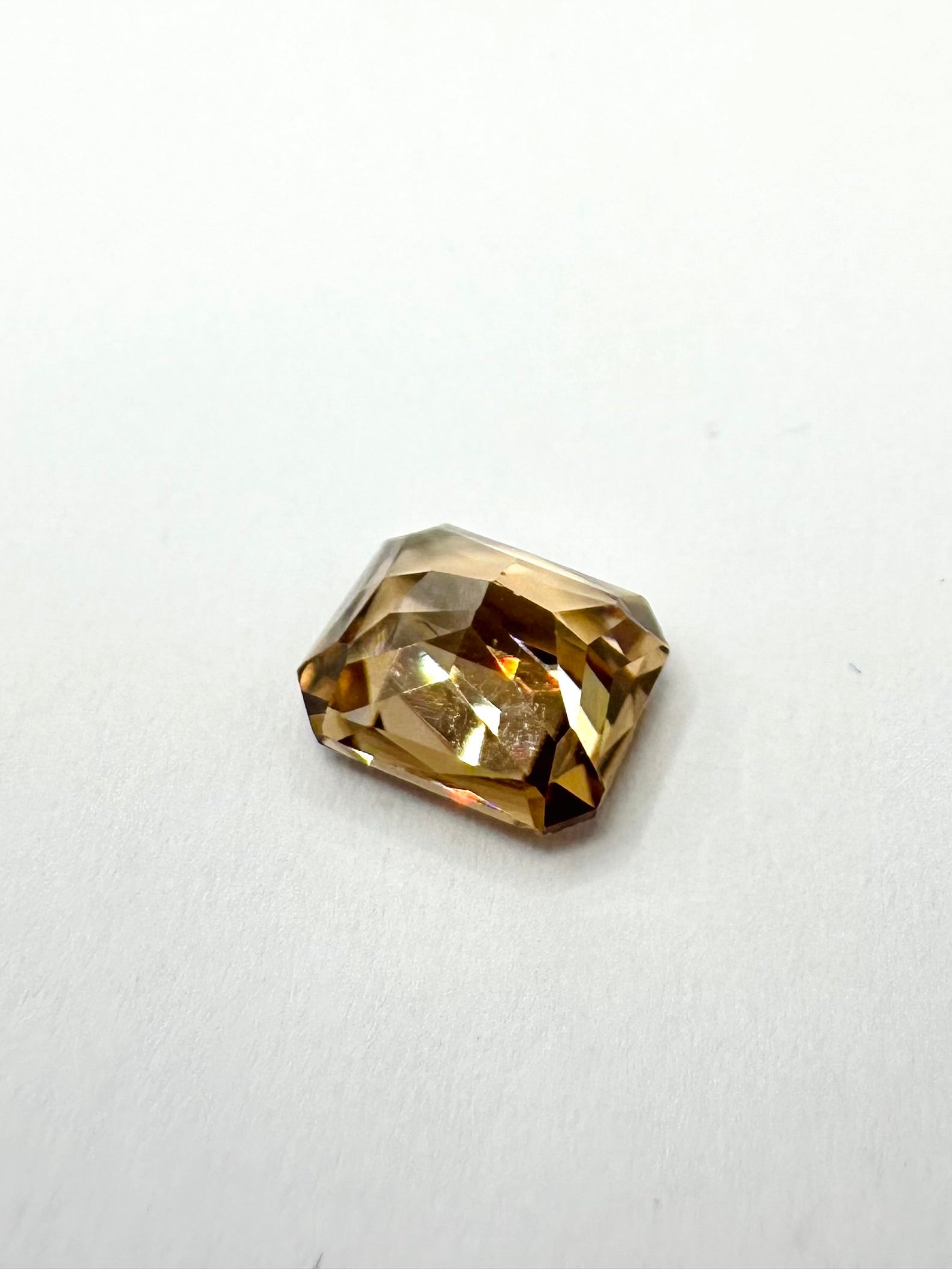 3.97cts 8.93x7.24mm Octagon Champagne Zircon