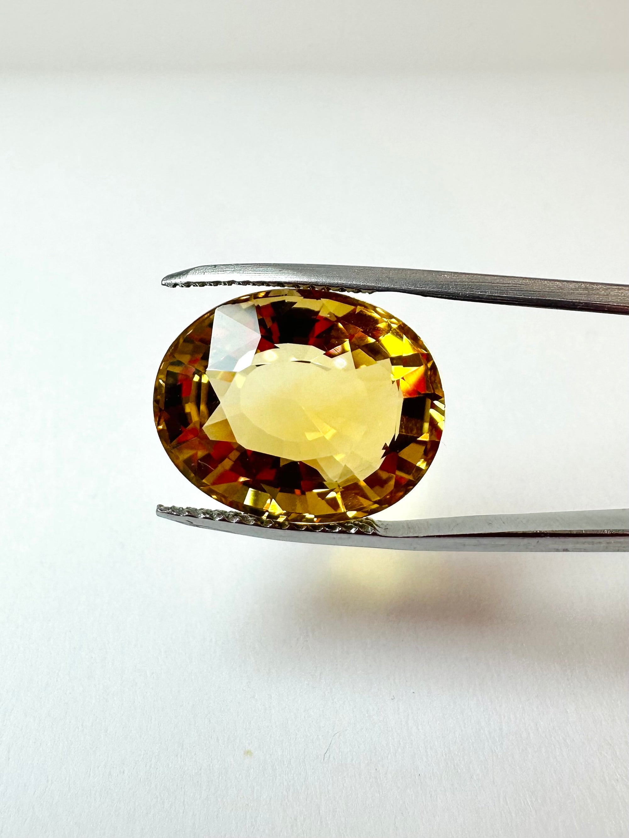 12.62cts 16.82x13.38mm Oval faceted Citrine