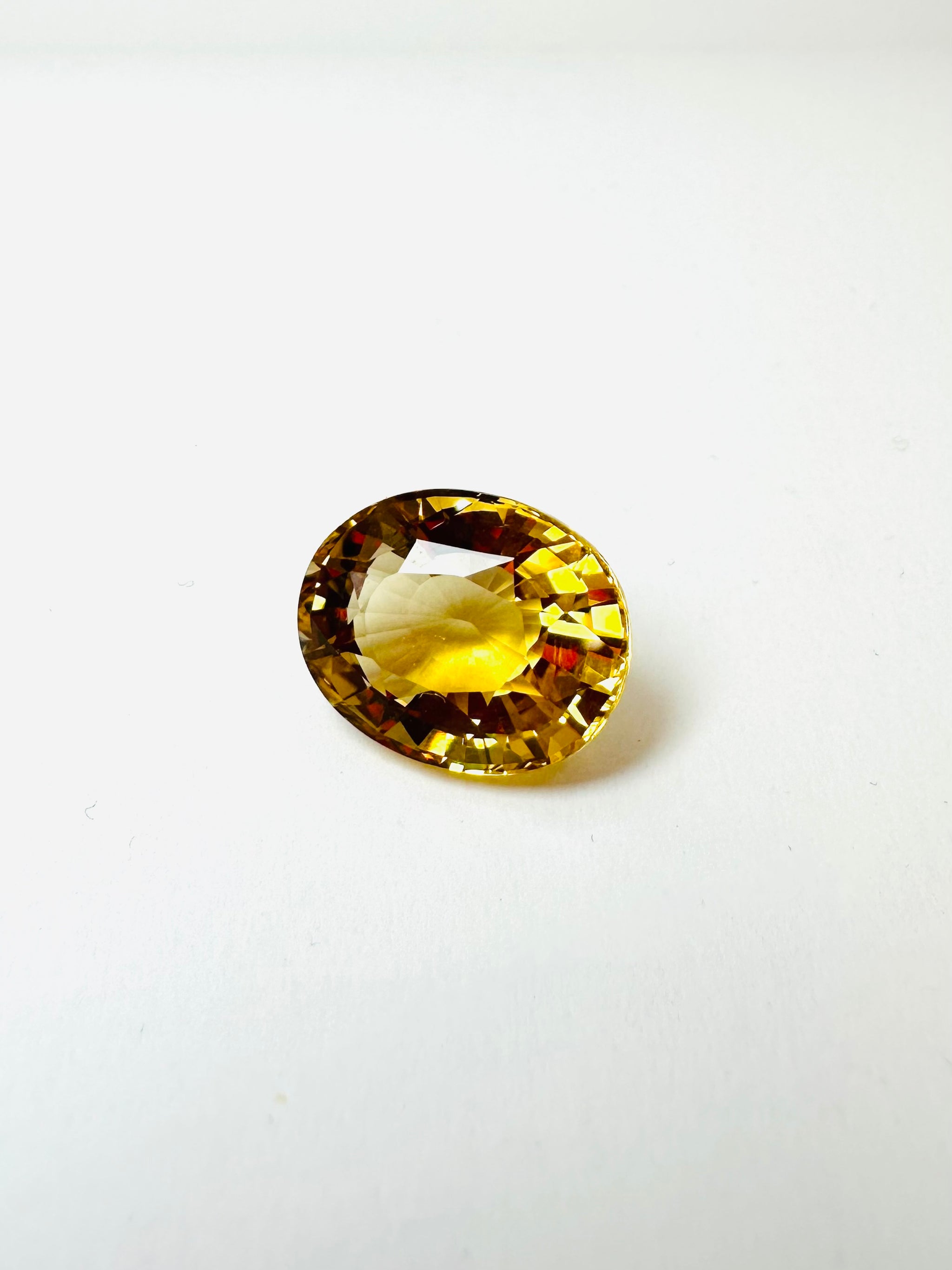 12.62cts 16.82x13.38mm Oval faceted Citrine