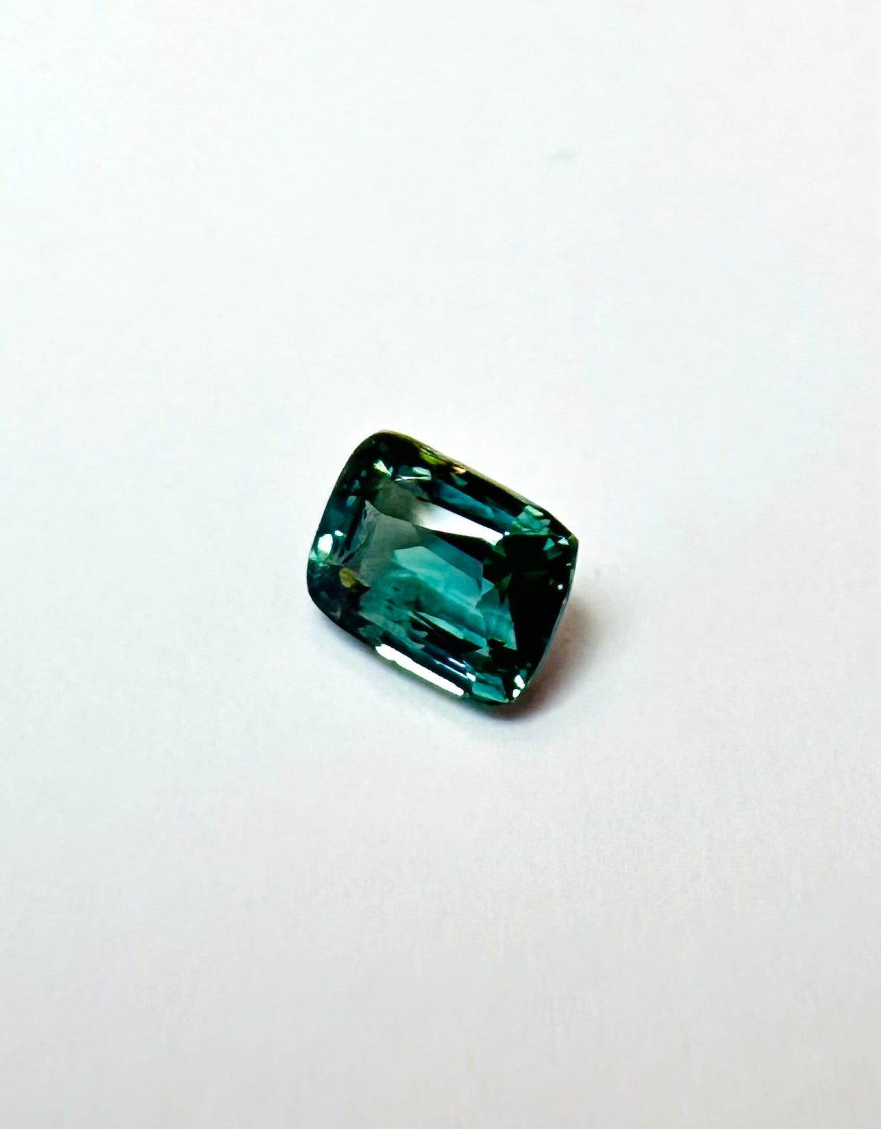 1.57cts 7.13x5.33mm Cushion Faceted Teal Sapphire