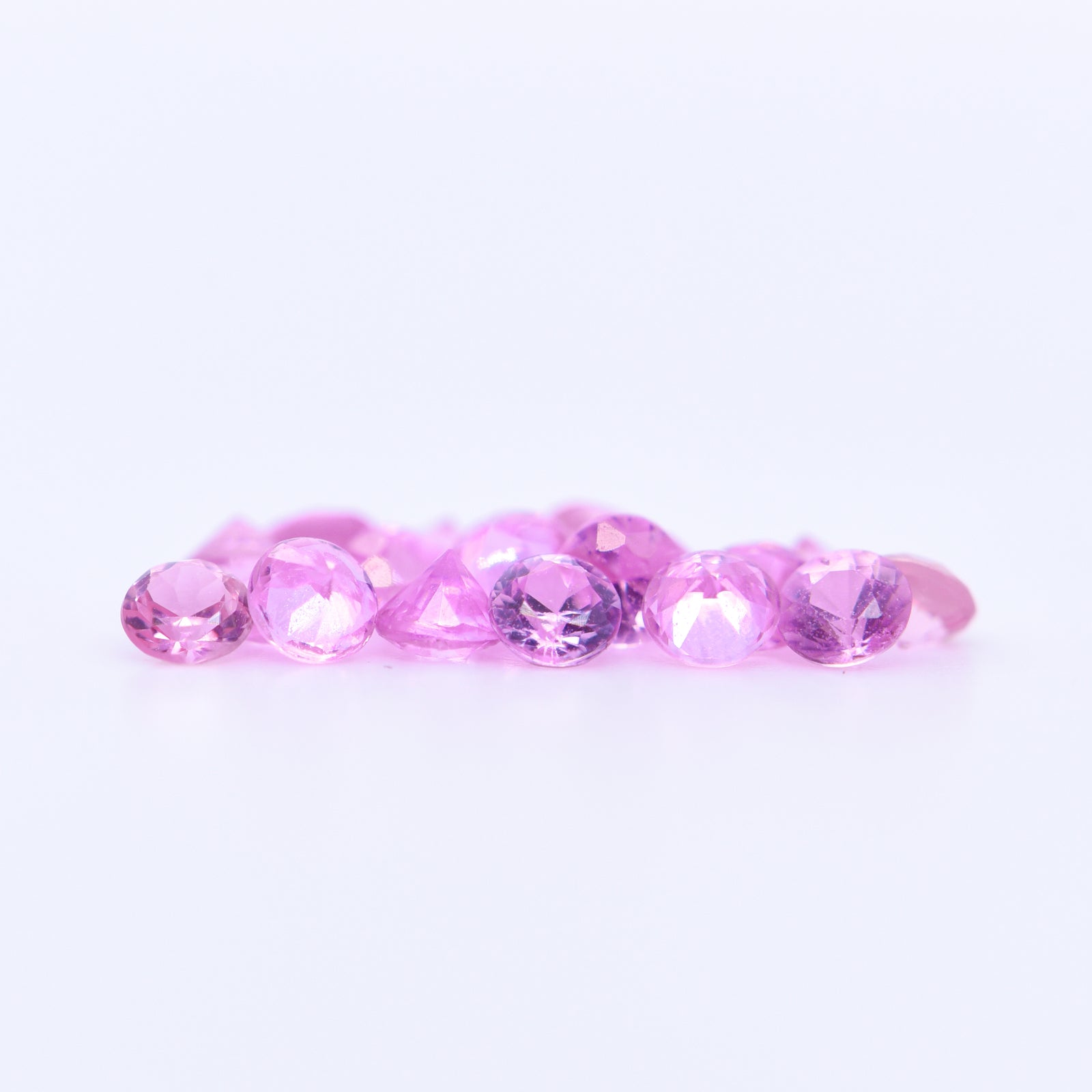 2.5mm Round Diamond Cut Pink Sapphires