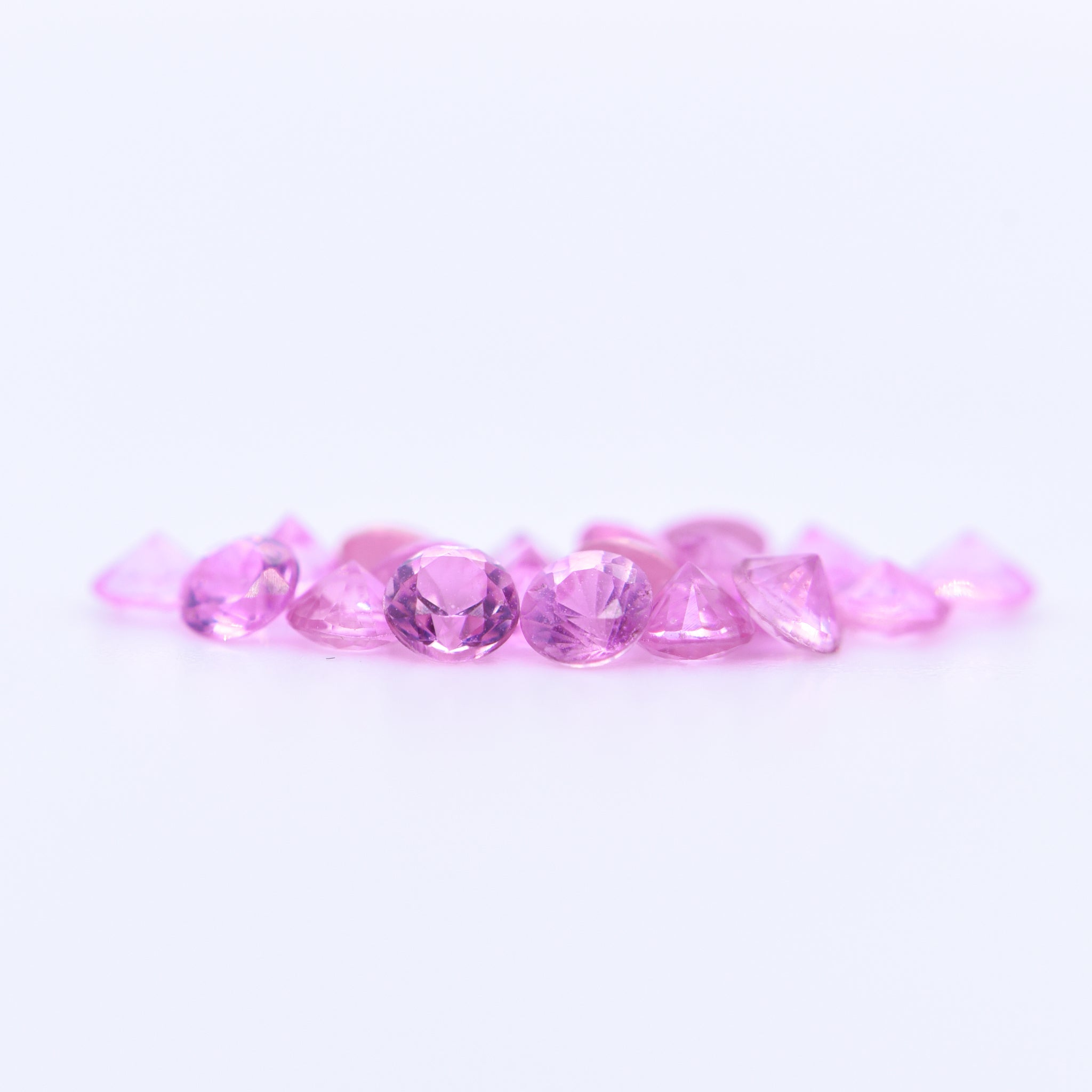 2.5mm Round Diamond Cut Pink Sapphires