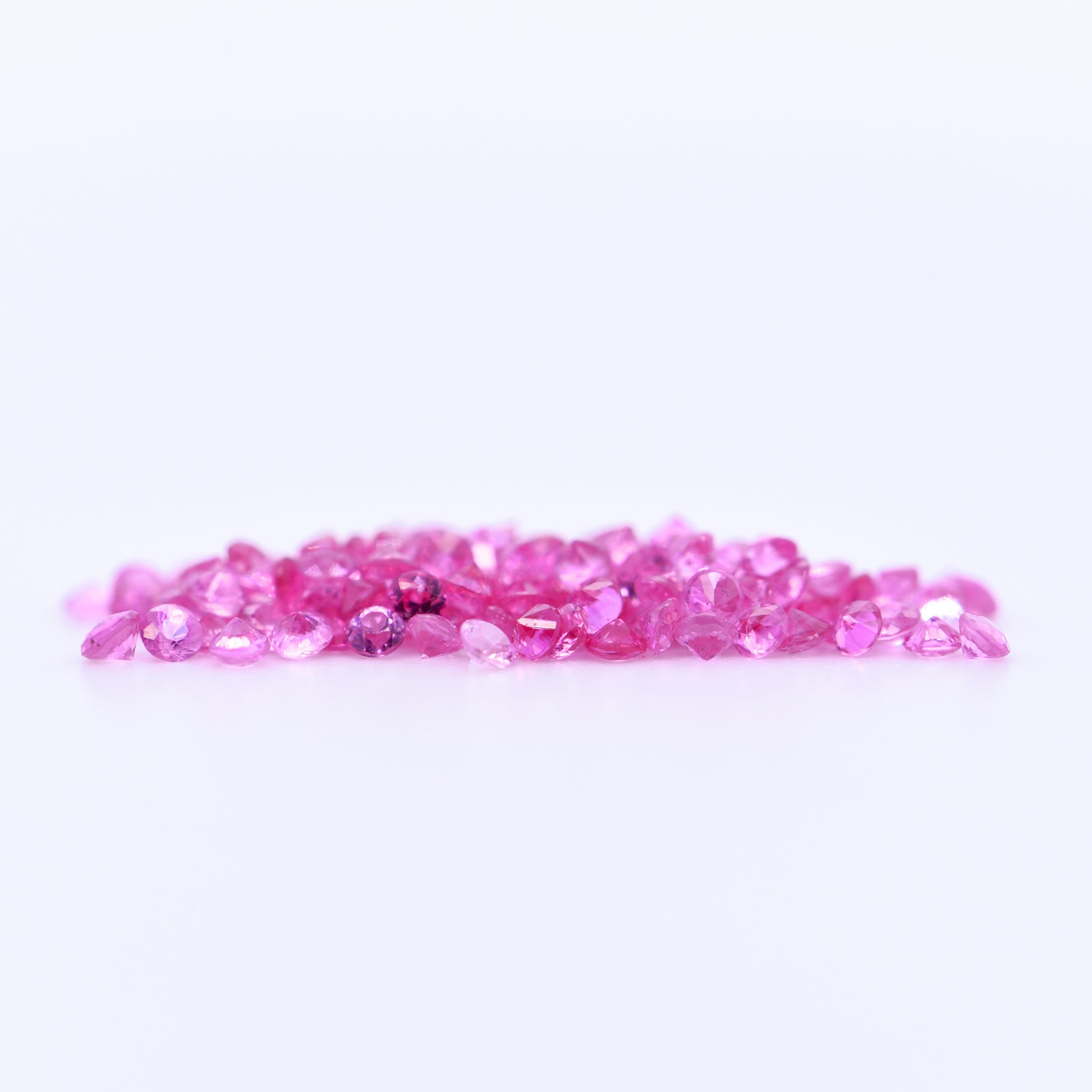 1.5mm Round Diamond Cut Pink Sapphires