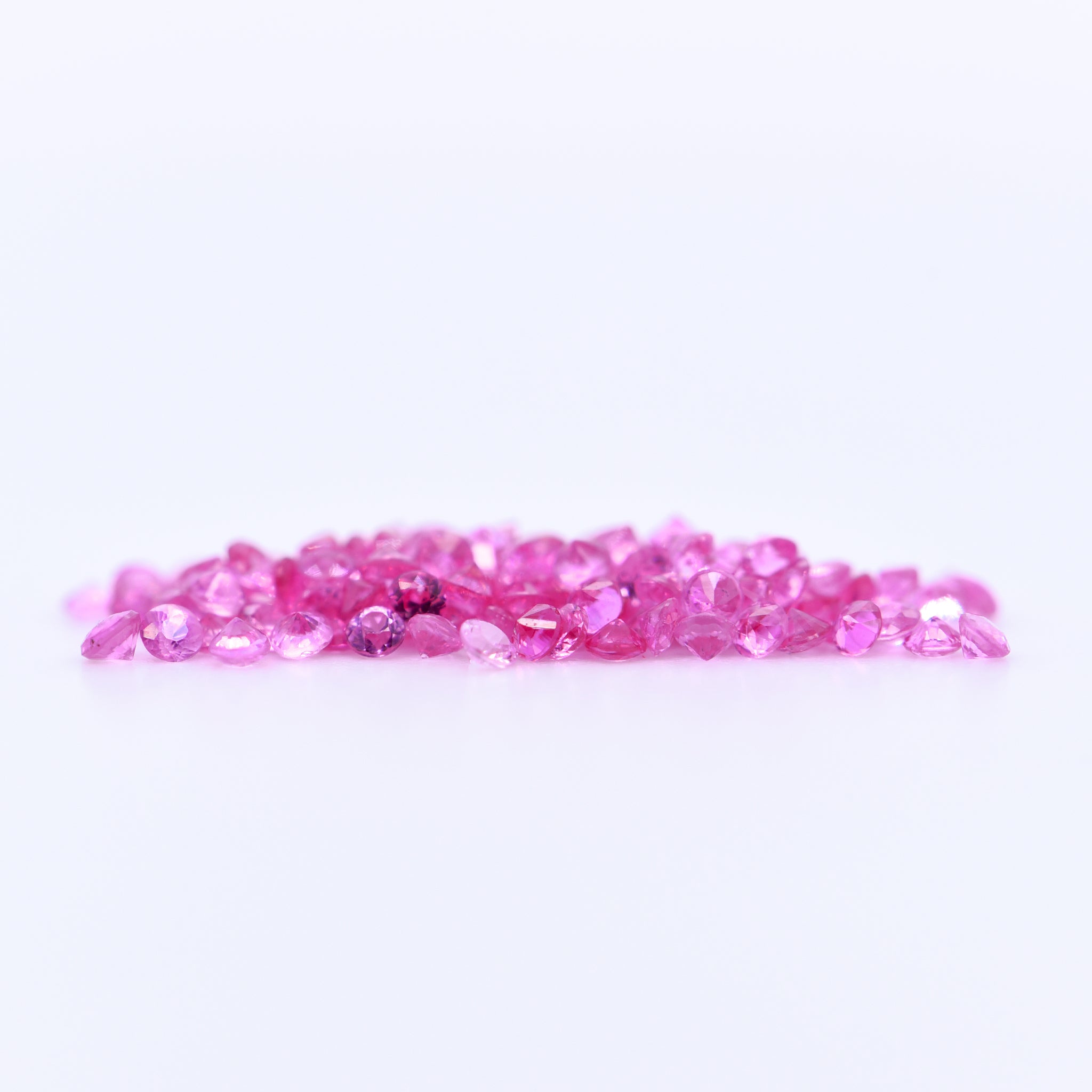 1.5mm Round Diamond Cut Pink Sapphires