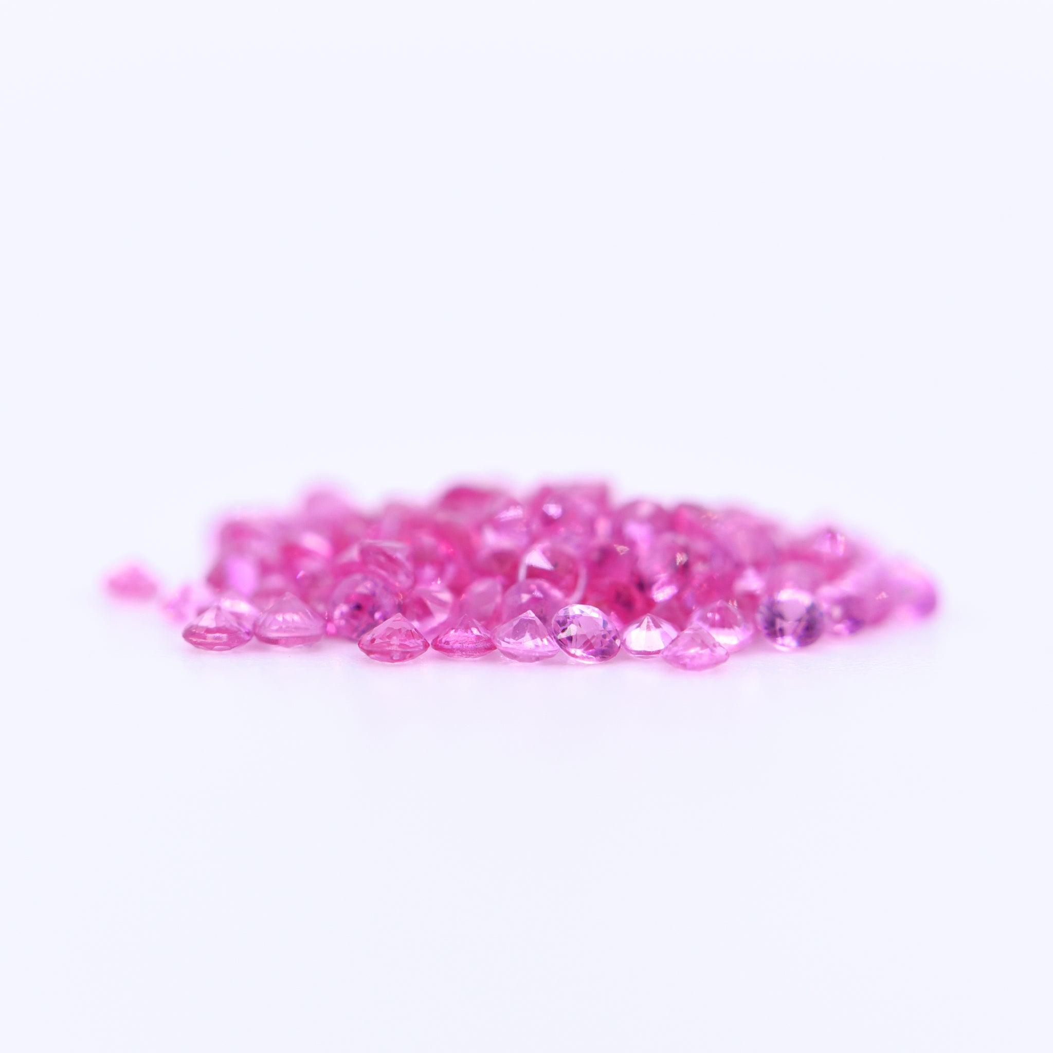 1.5mm Round Diamond Cut Pink Sapphires