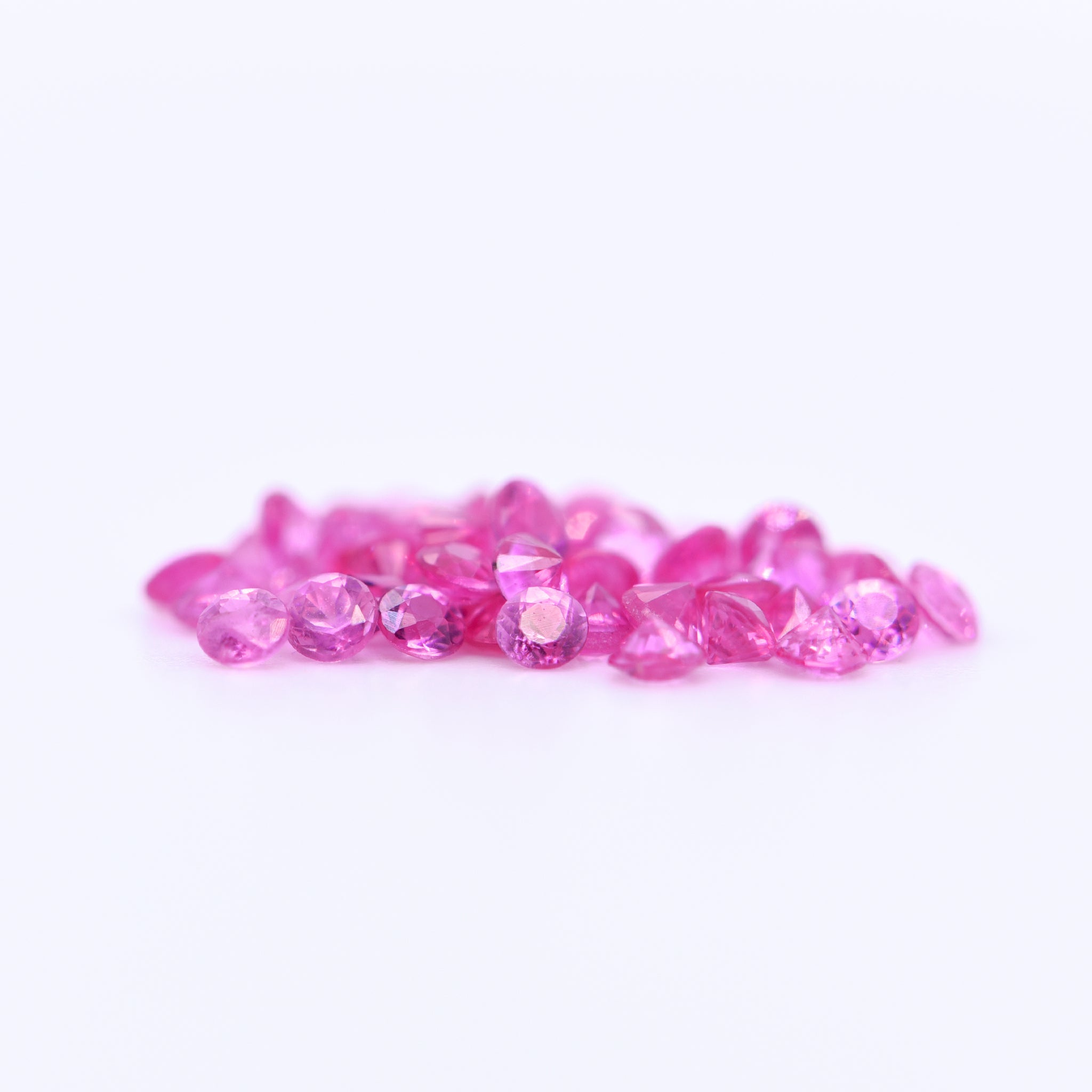 2mm Round Diamond Cut Pink Sapphires