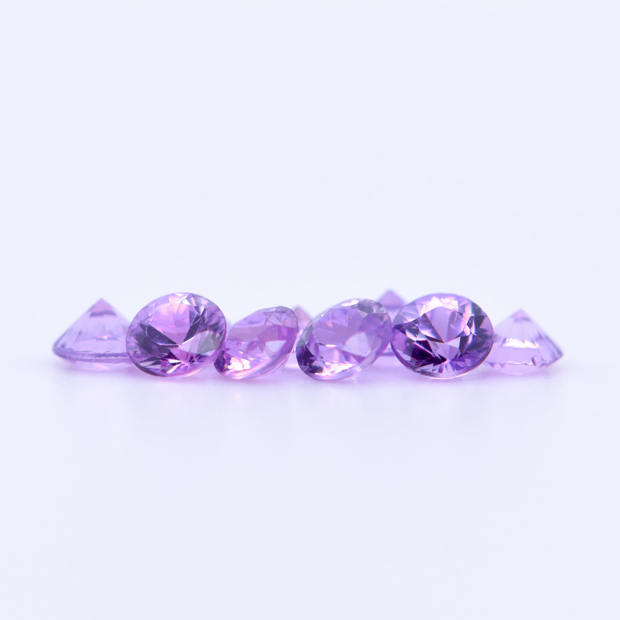 2.75mm Round Diamond Cut Purple Sapphires