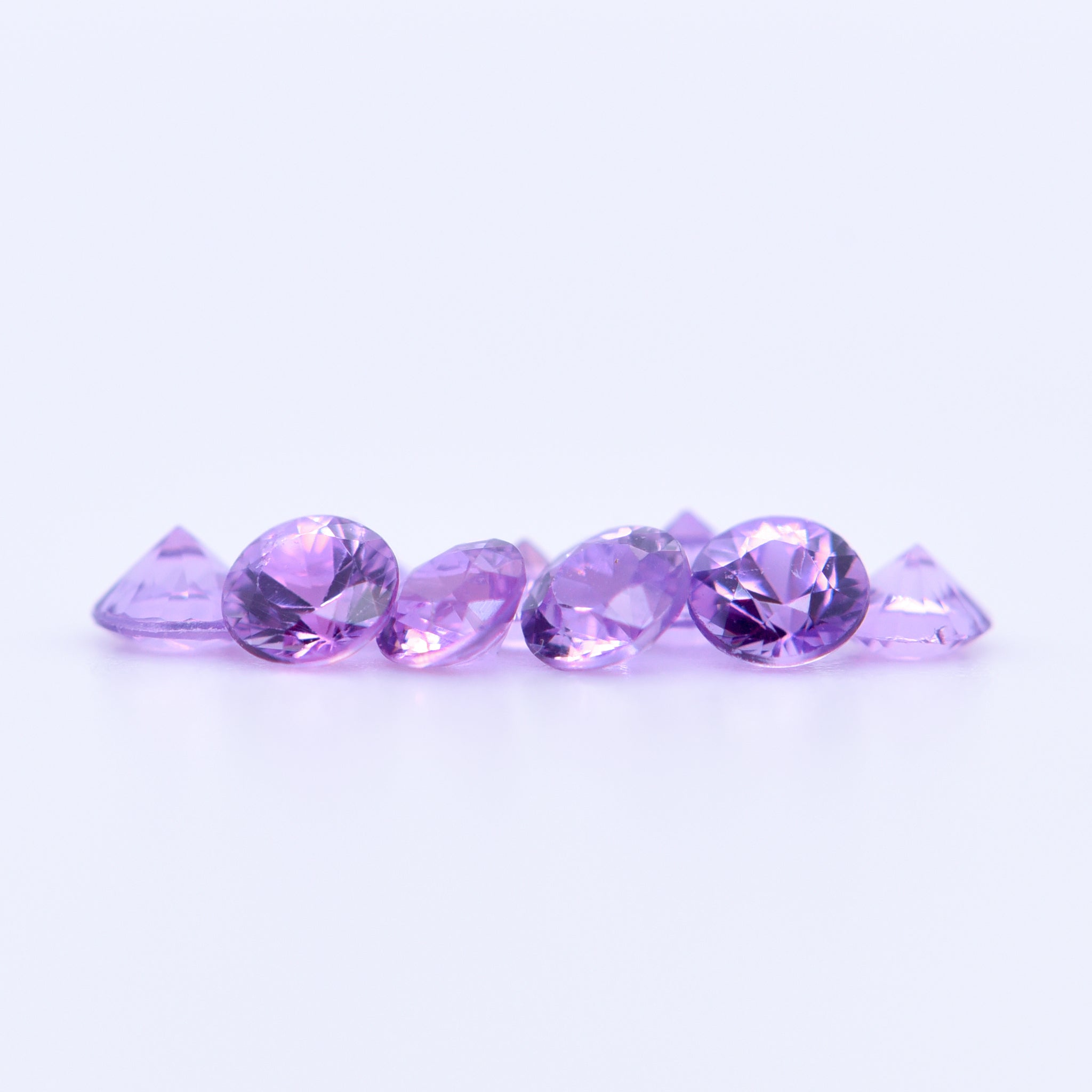 2.75mm Round Diamond Cut Purple Sapphires