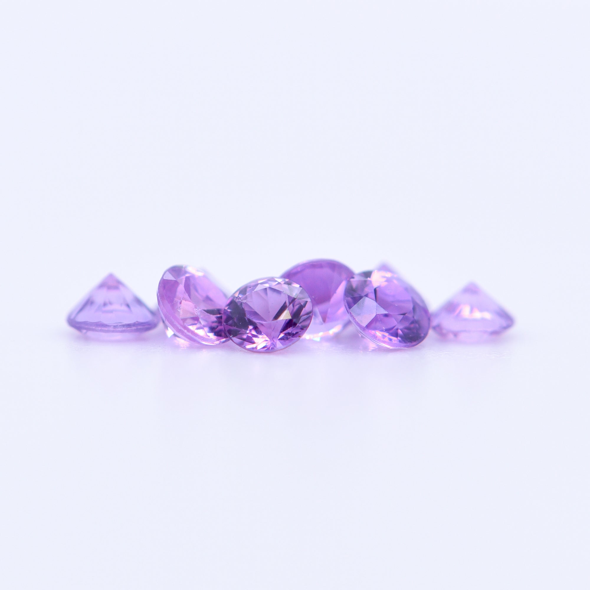 2.75mm Round Diamond Cut Purple Sapphires