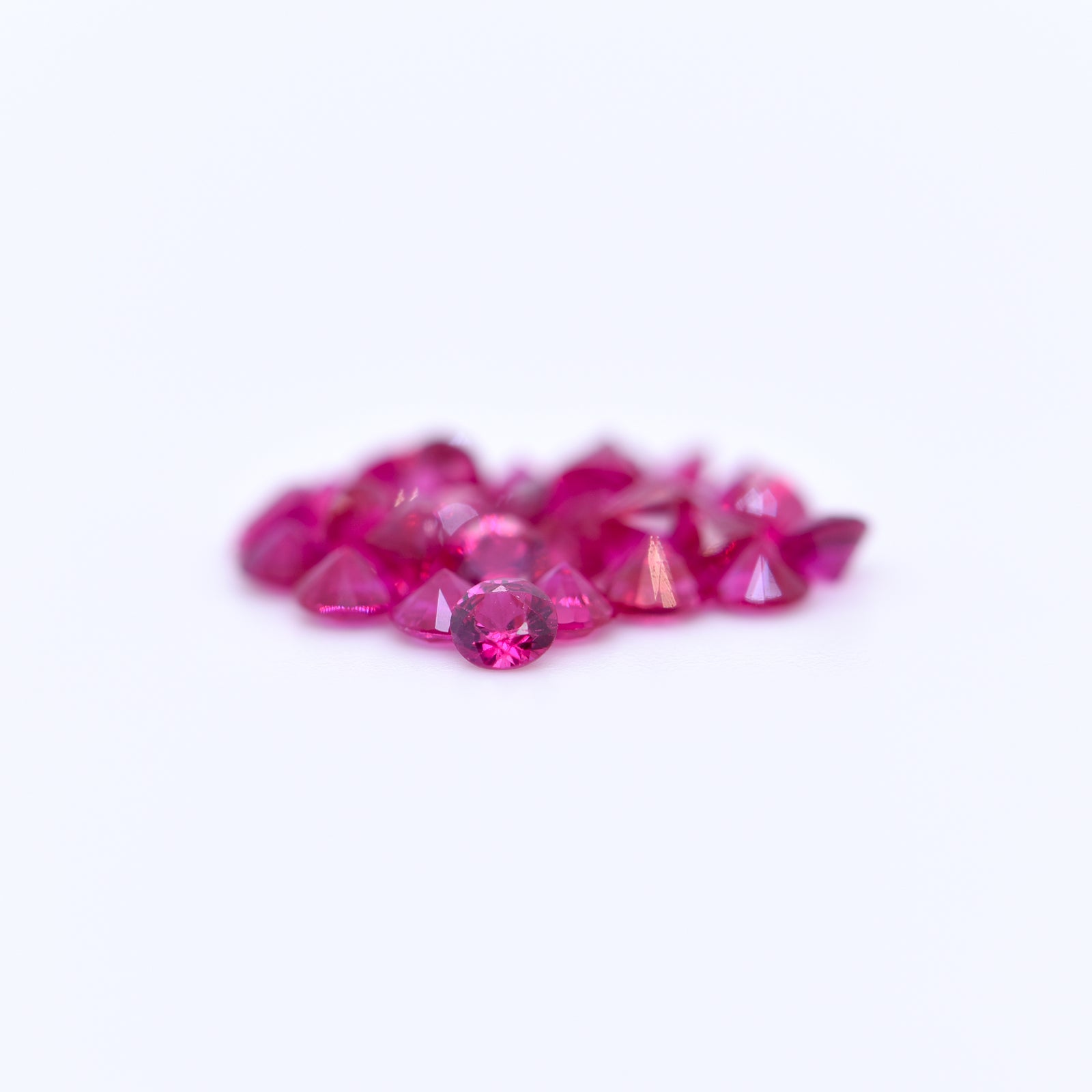 2.75mm Round Diamond Cut Pink Rubies