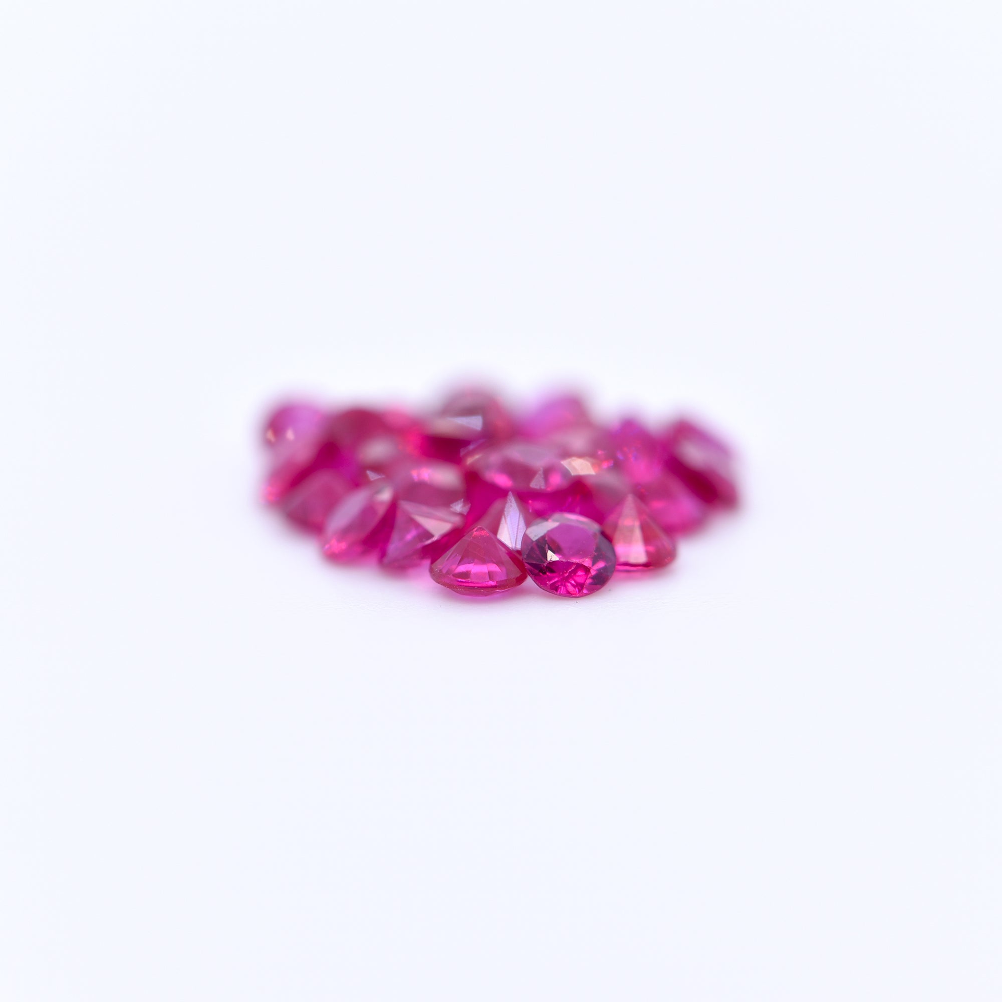 2.75mm Round Diamond Cut Pink Rubies