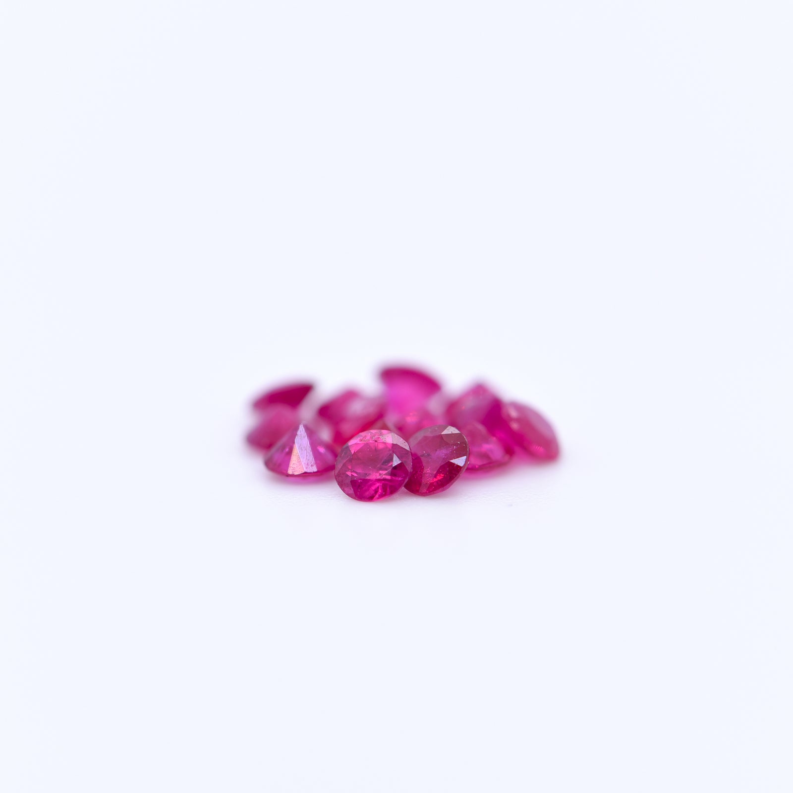 2.75mm Round Diamond Cut Pink Rubies