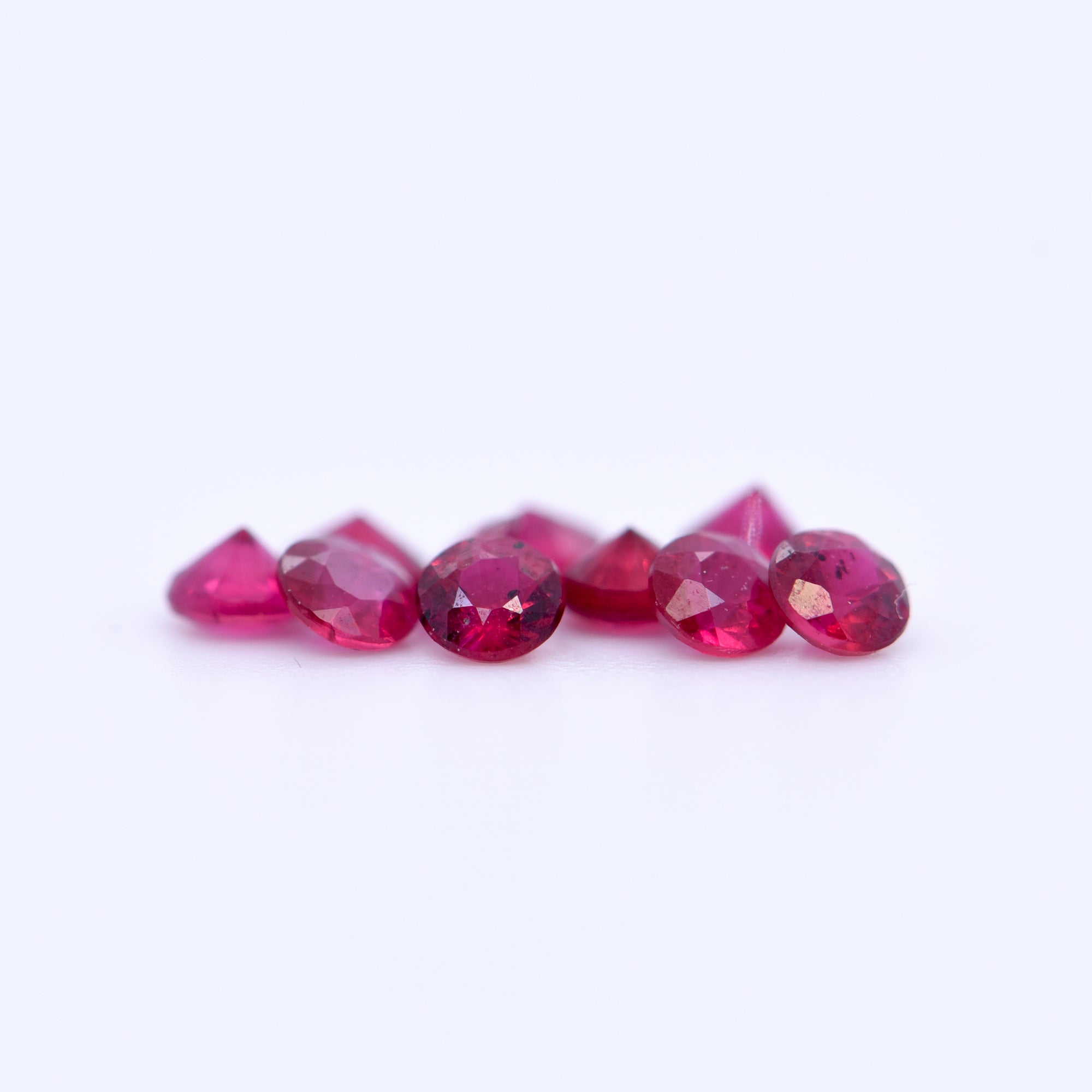 2.5mm Round Diamond Cut Red Rubies