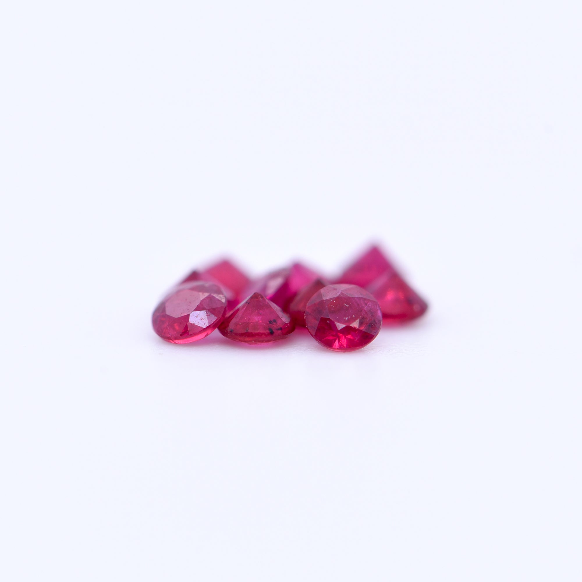 2.5mm Round Diamond Cut Red Rubies