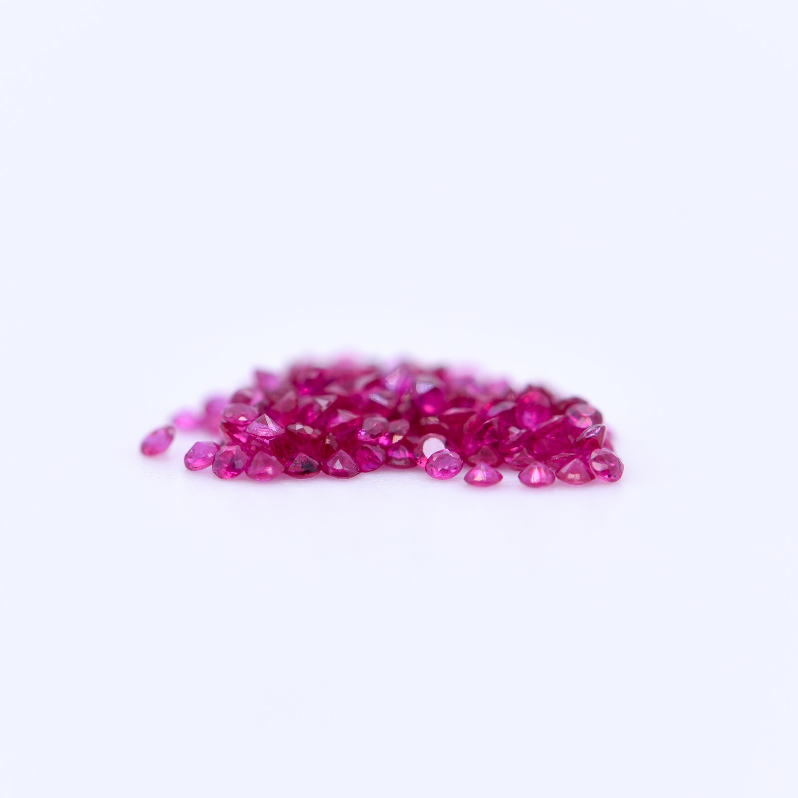 1mm Round Diamond Cut Pink Rubies