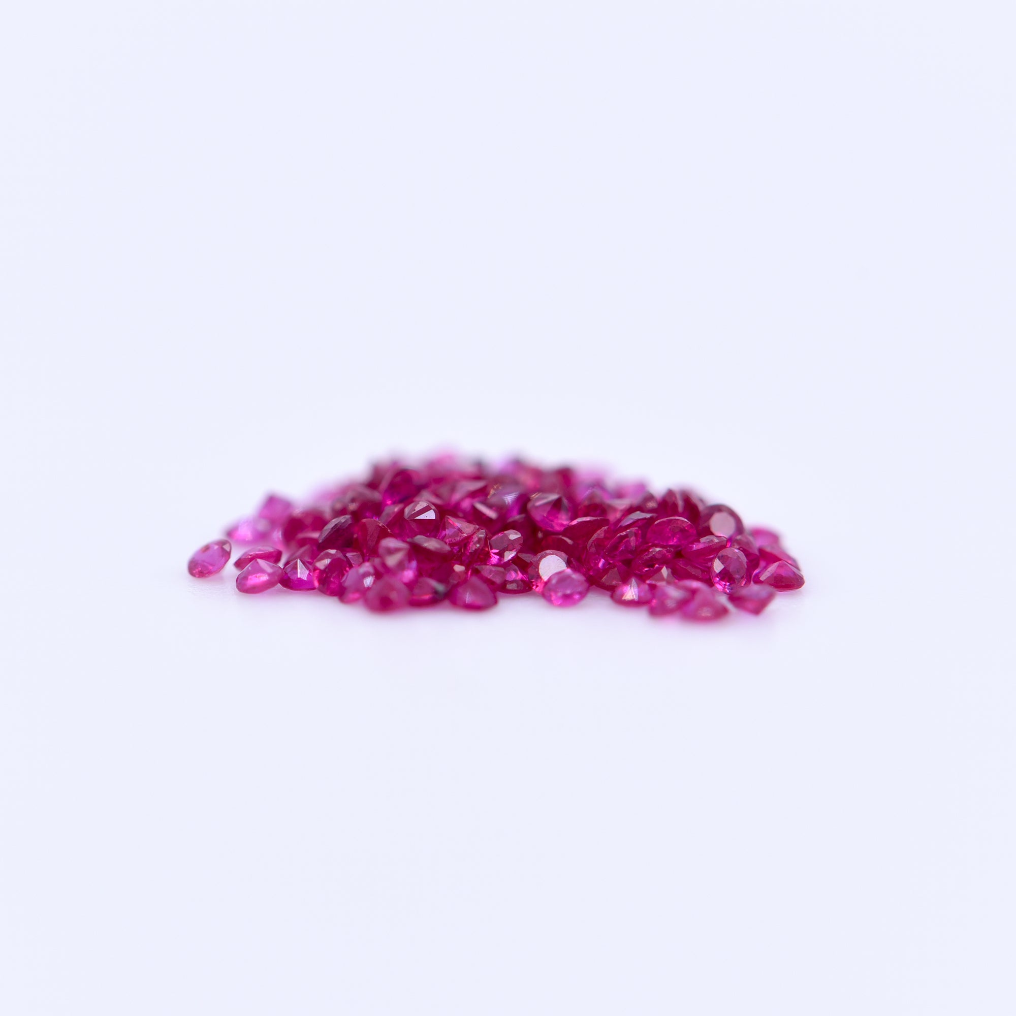 1mm Round Diamond Cut Pink Rubies