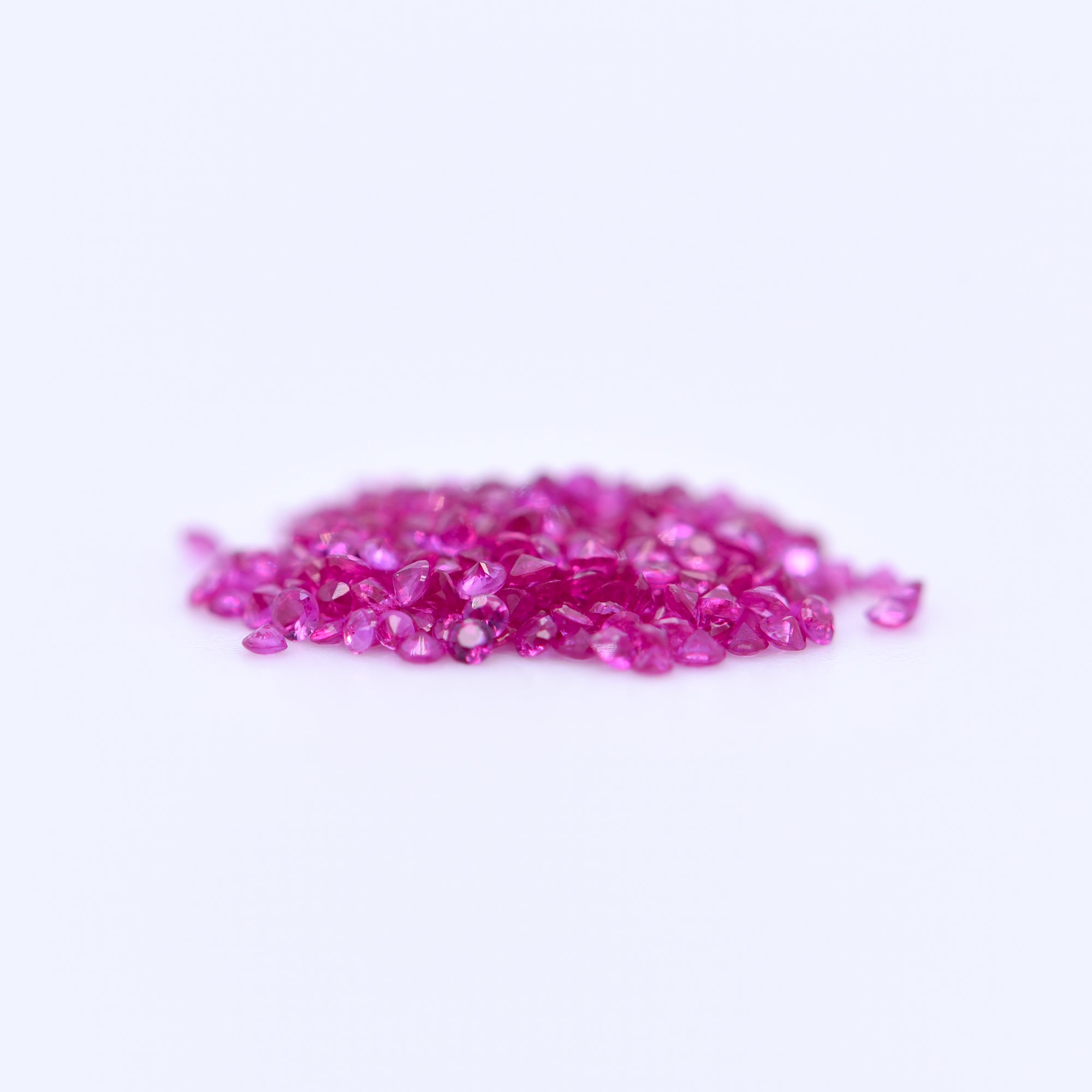 1mm Round Diamond Cut Pink Rubies