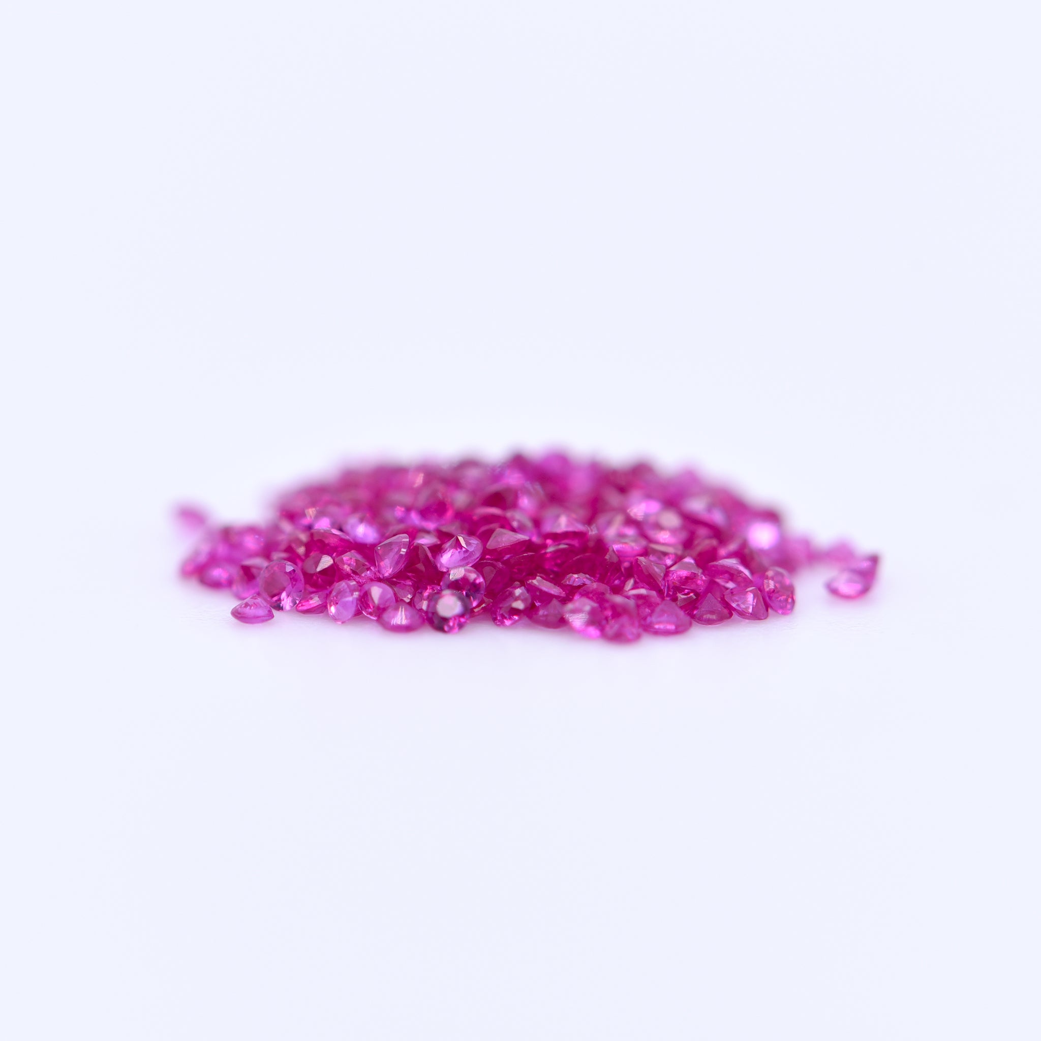 1mm Round Diamond Cut Pink Rubies