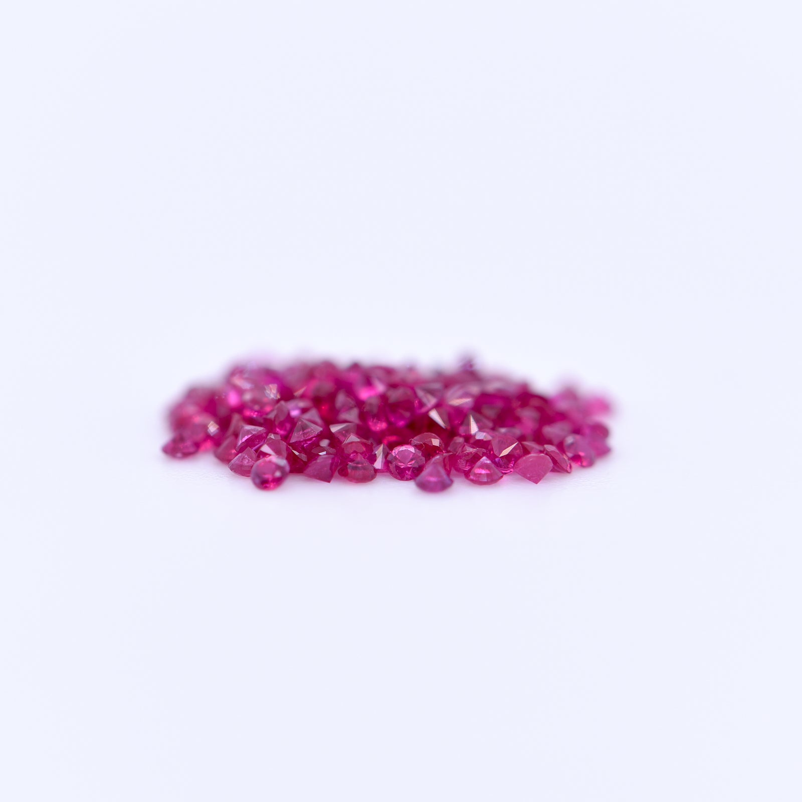 1mm Round Diamond Cut Pink Rubies