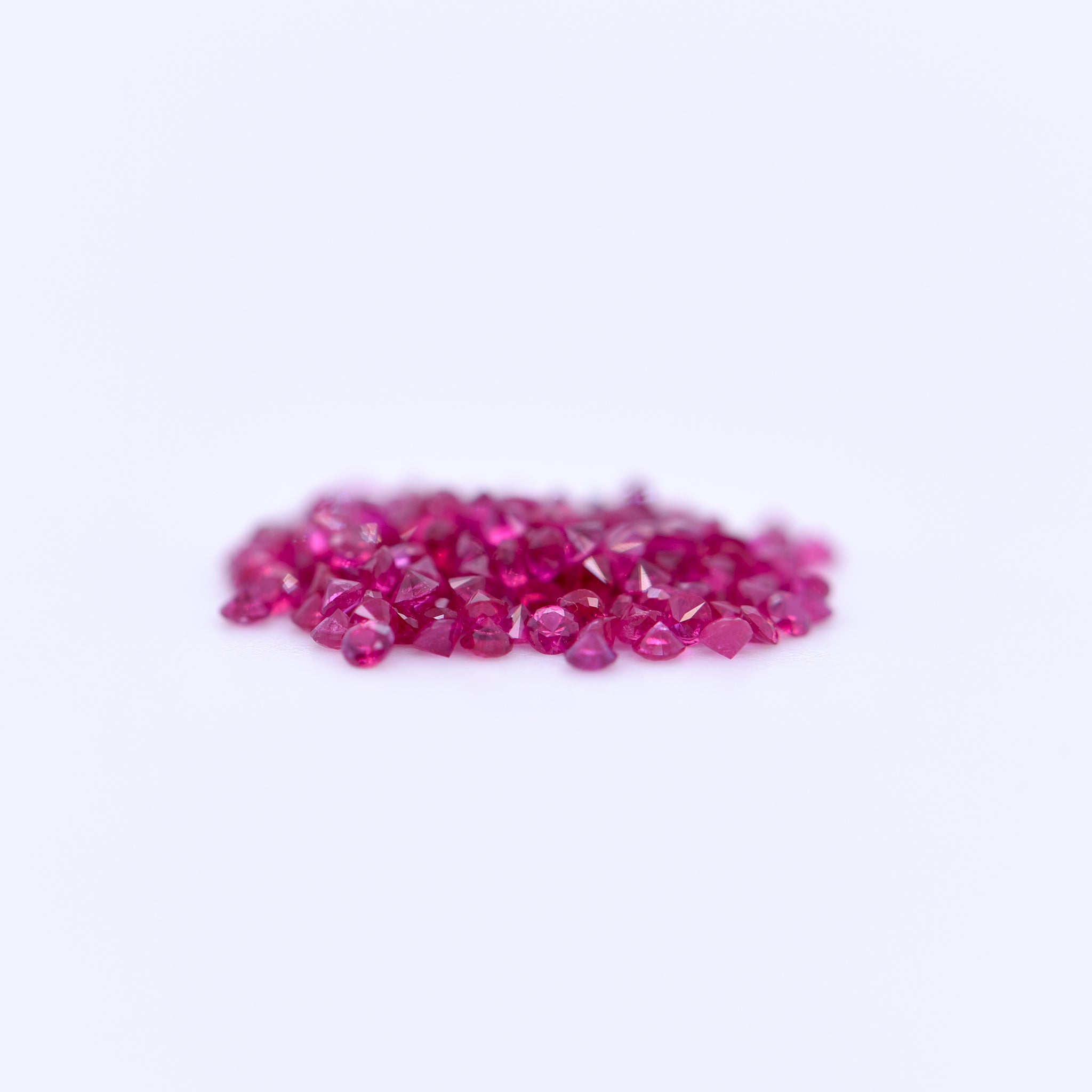 1mm Round Diamond Cut Pink Rubies